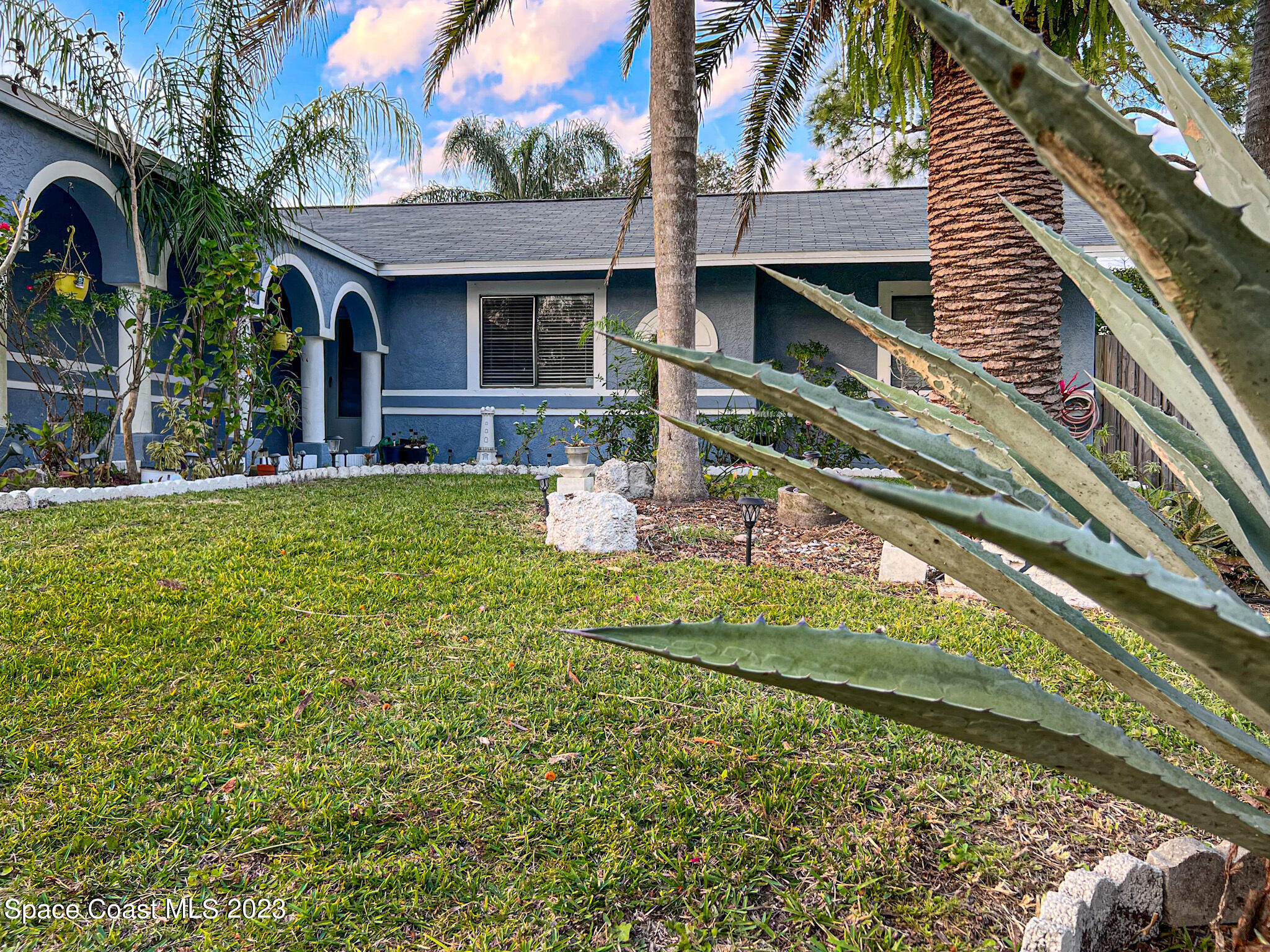 411 Trier Road Northwest Palm Bay, FL 32907 - Photo 2 of 24 Front