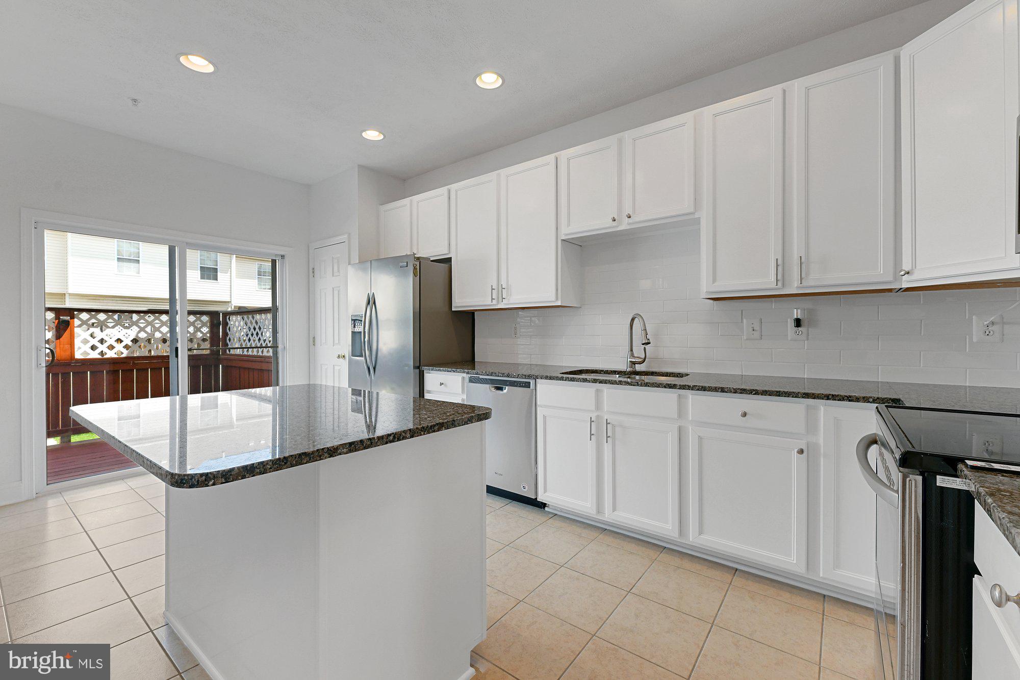 827 Middle River Road Baltimore, MD 21220 - Photo 11 of 29 Kitchen with granite counter tops