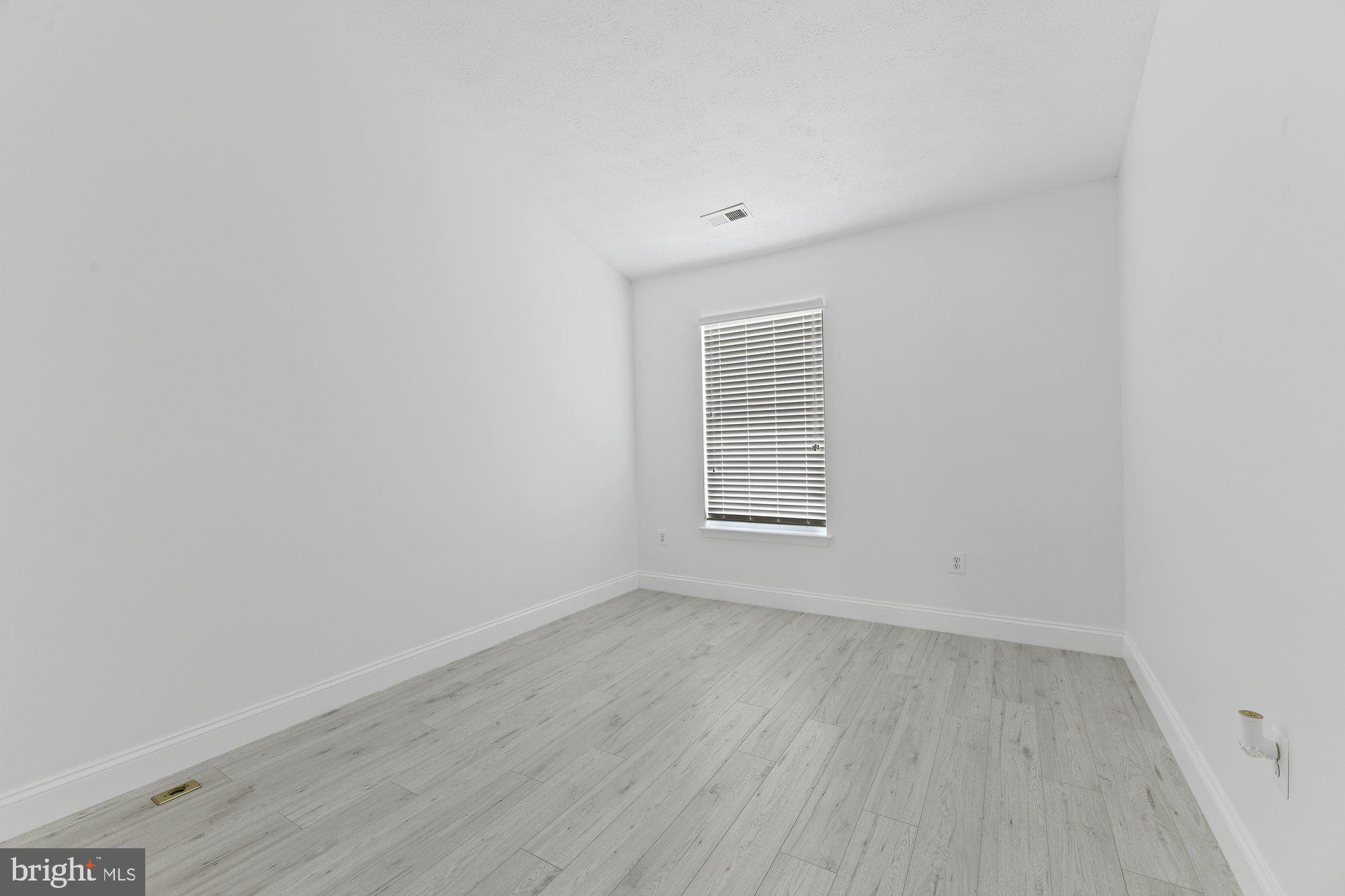 827 Middle River Road Baltimore, MD 21220 - Photo 16 of 29 Bedroom #2 with vaulted ceilings