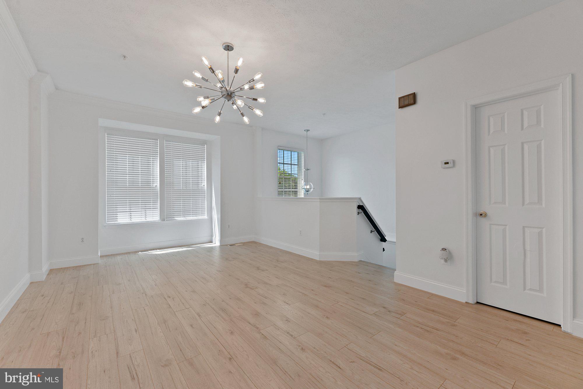 827 Middle River Road Baltimore, MD 21220 - Photo 3 of 29 Living room with bay window