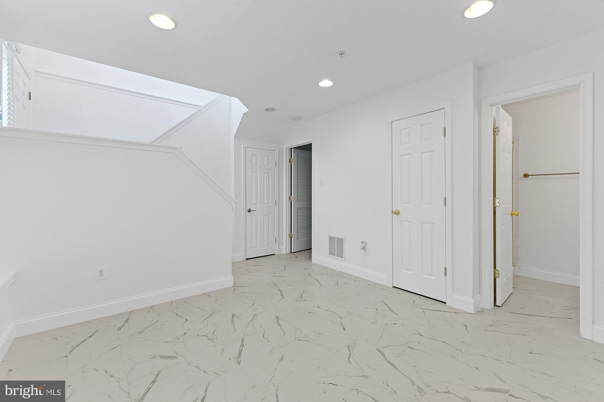 827 Middle River Road Baltimore, MD 21220 - Photo 20 of 29 Finished family room with garage access