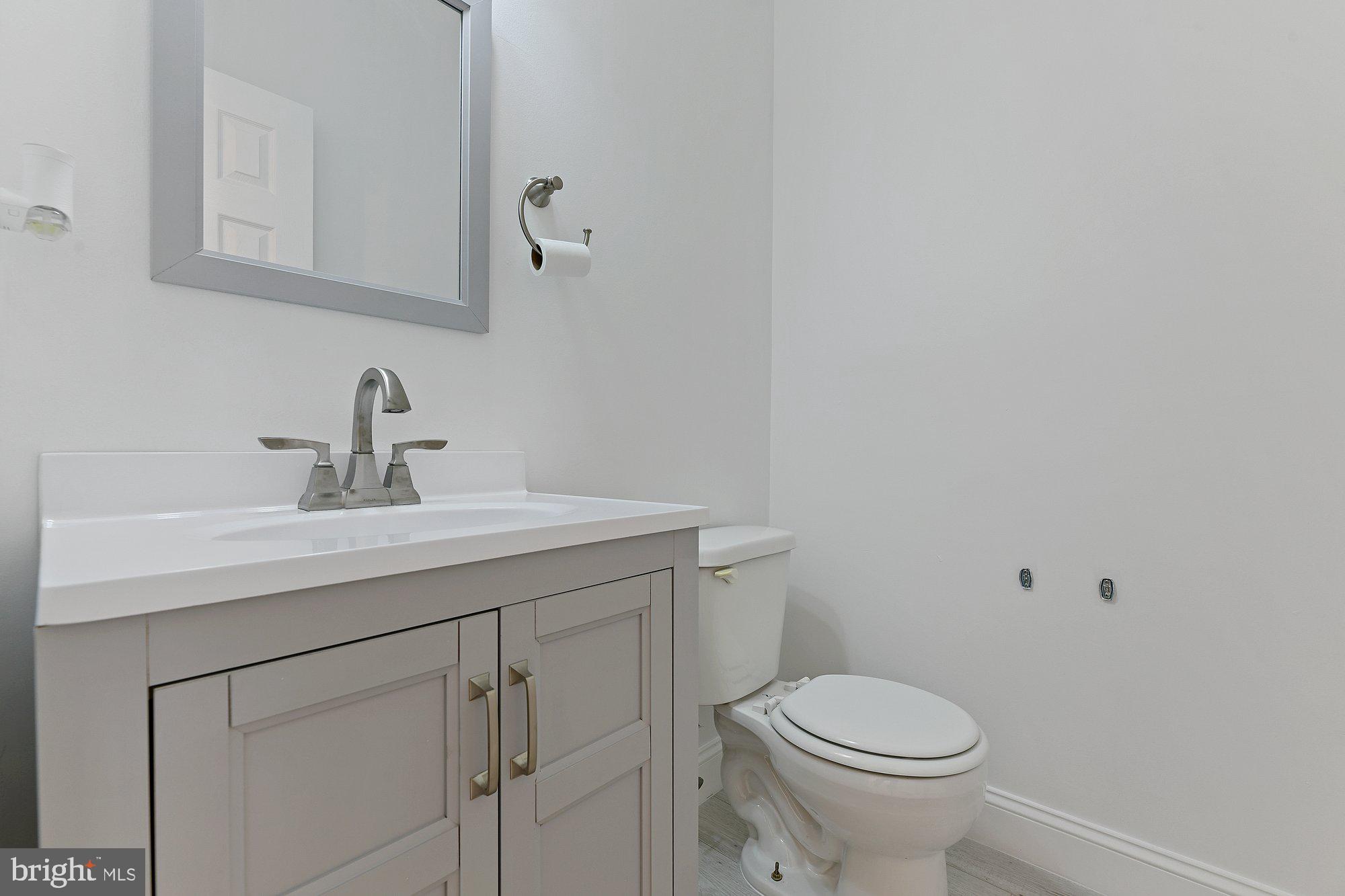 827 Middle River Road Baltimore, MD 21220 - Photo 5 of 29 Brand new main level powder room