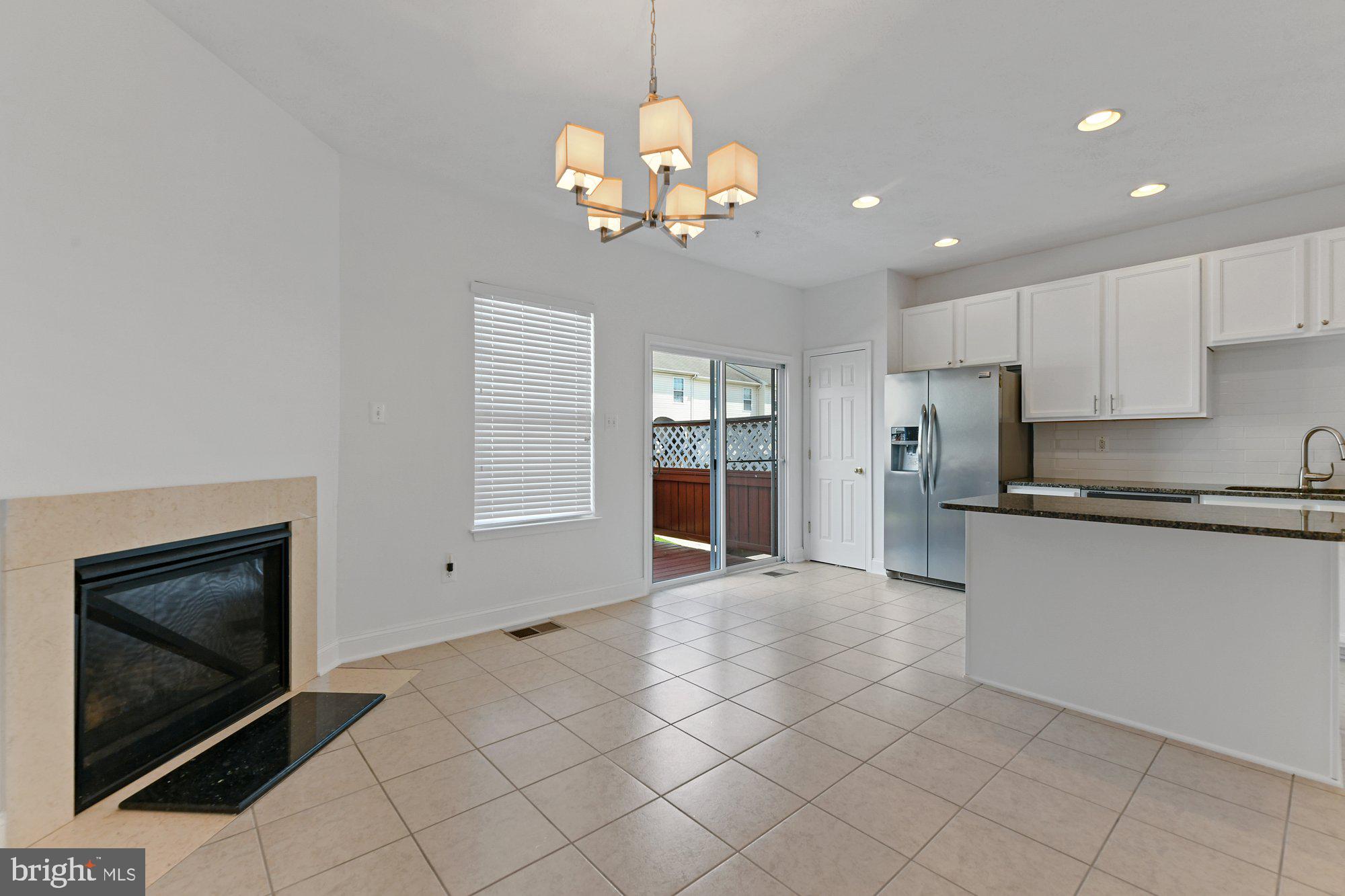 827 Middle River Road Baltimore, MD 21220 - Photo 7 of 29 Kitchen with gas fireplace