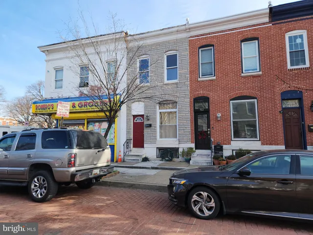 a car parked in front of a building
