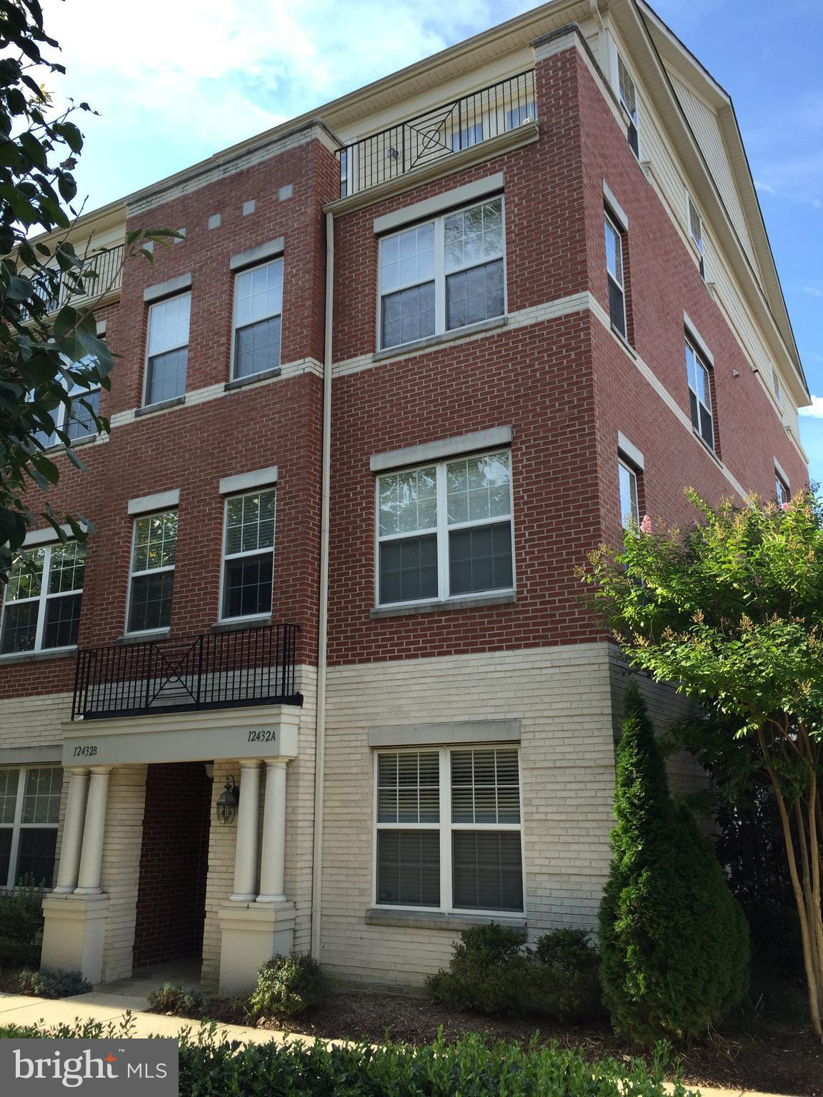 12432 Liberty Bridge Road, Unit A Fairfax, VA 22033 - Photo 1 of 14 a front view of a building