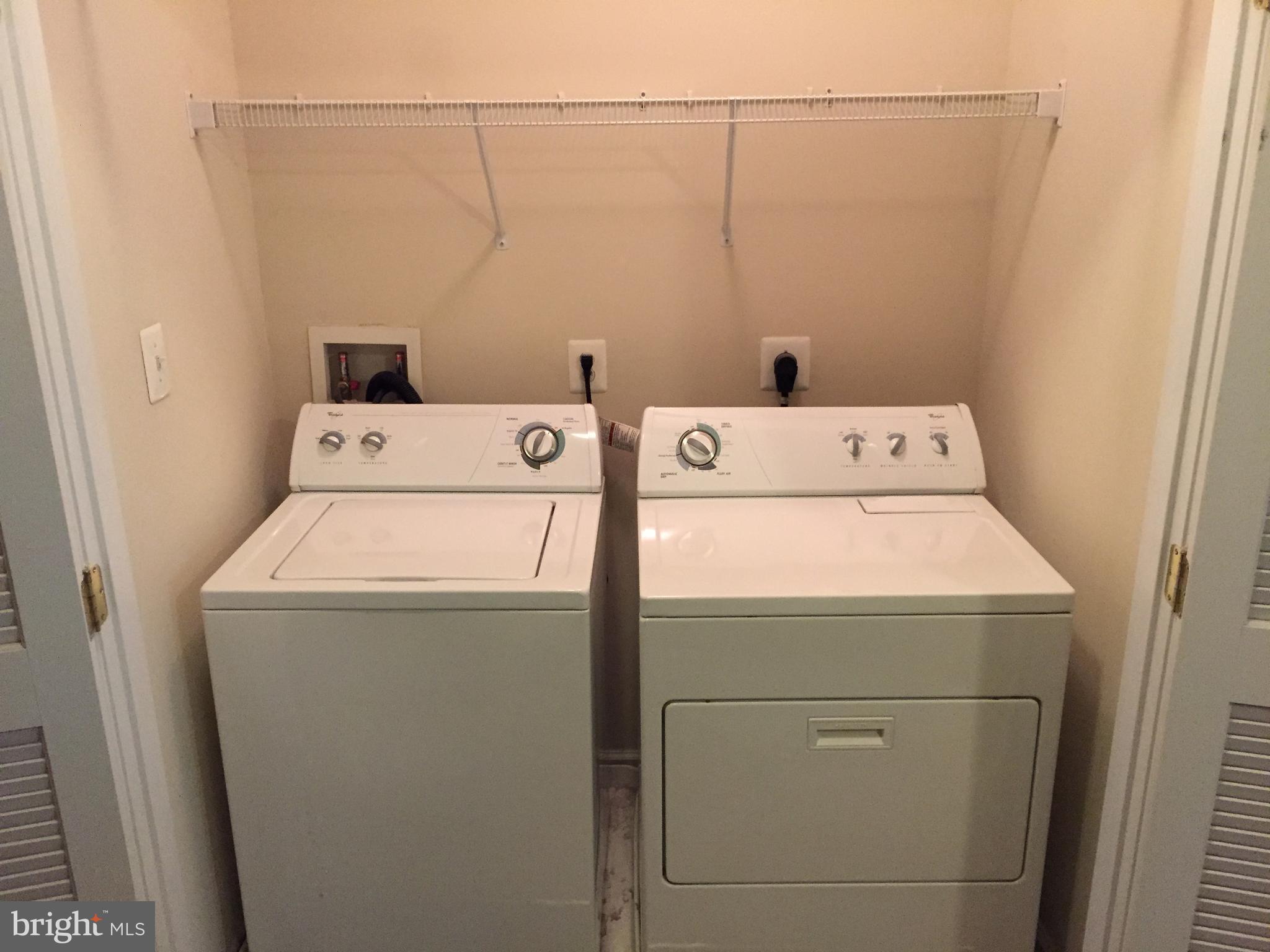 12432 Liberty Bridge Road, Unit A Fairfax, VA 22033 - Photo 14 of 14 a utility room with dryer and washer