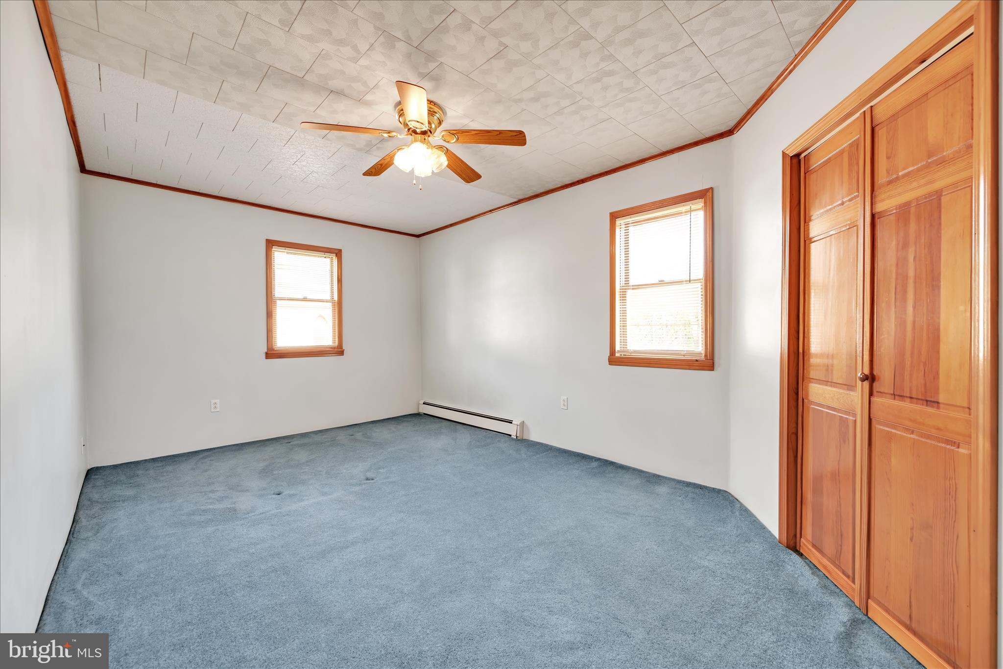 283 South Tulpehocken Street Pine Grove, PA 17963 - Photo 15 of 35 an empty room with windows and chandelier fan