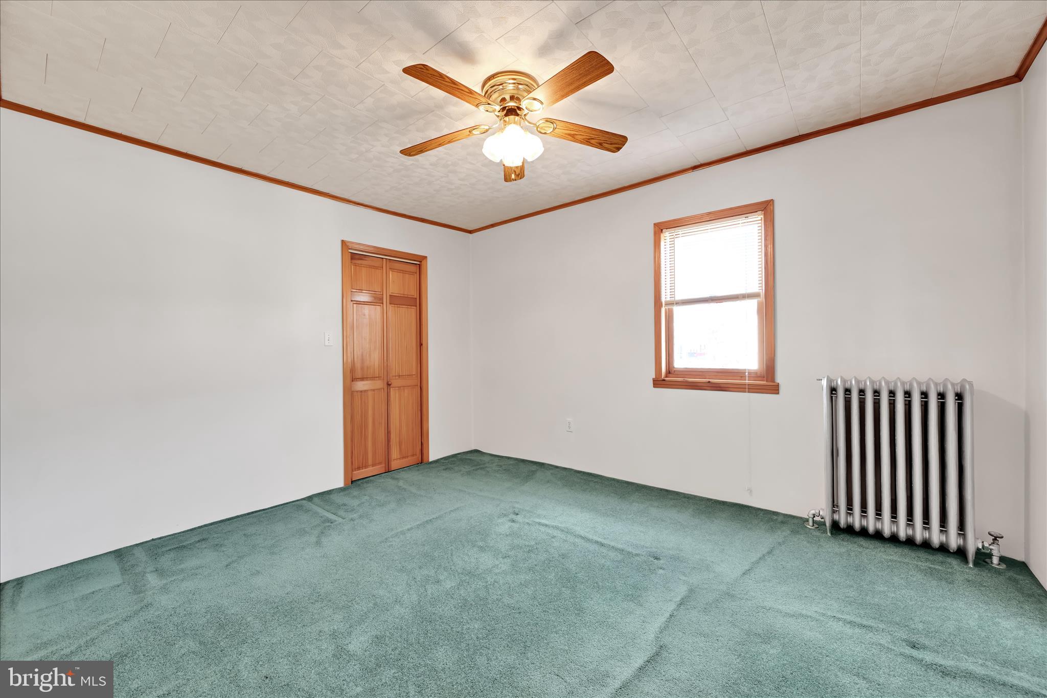 283 South Tulpehocken Street Pine Grove, PA 17963 - Photo 18 of 35 an empty room with windows and fan
