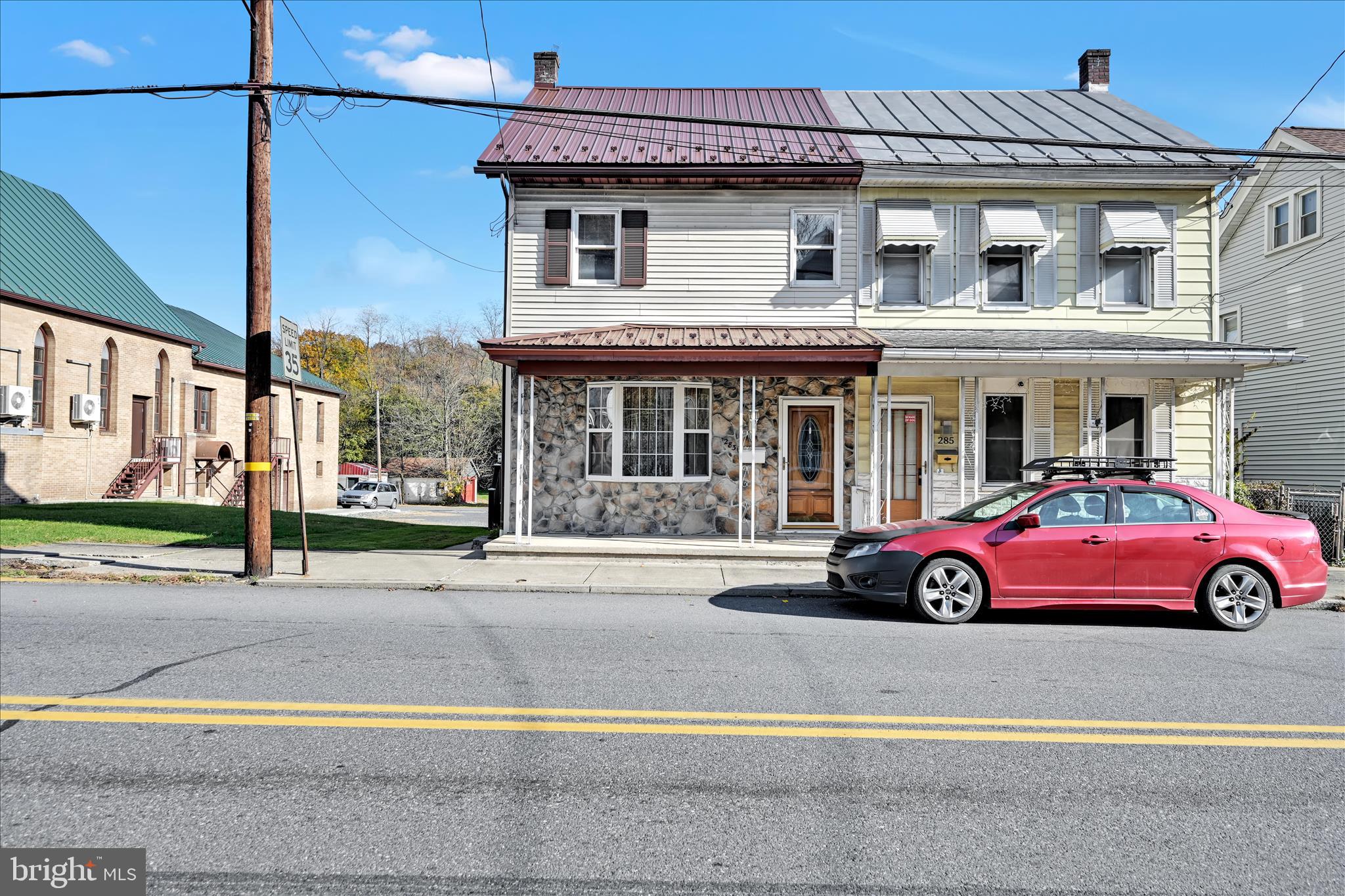 283 South Tulpehocken Street Pine Grove, PA 17963 - Photo 2 of 35 a front view of a house with parking space