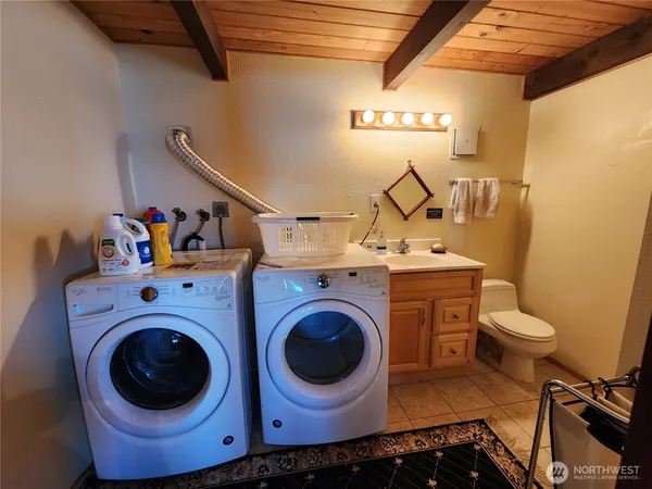 a bathroom with a sink and a shower