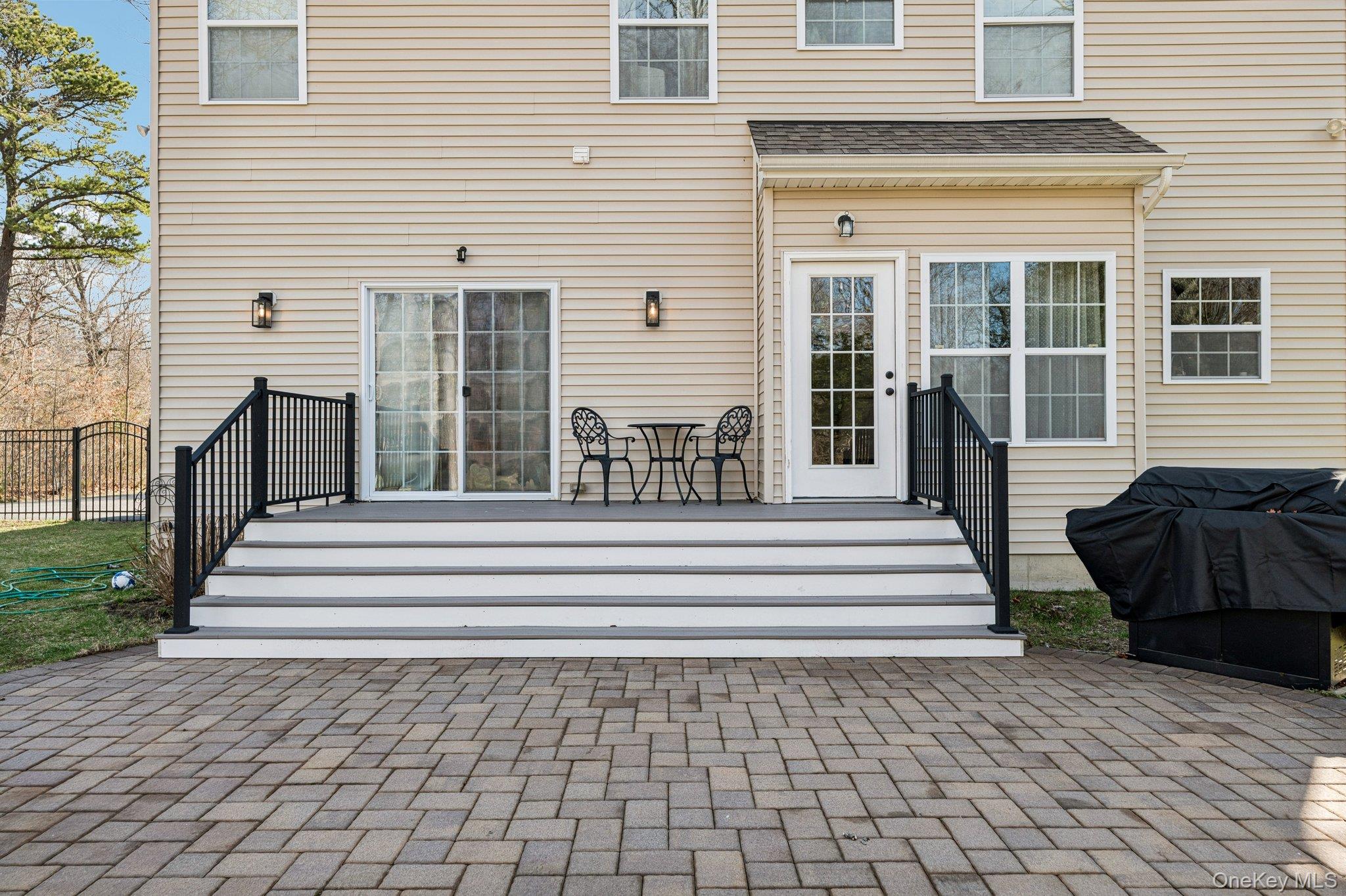 4 Clinton Avenue Bellport, NY 11713 - Photo 30 of 34 a view of a building with entryway and stairs