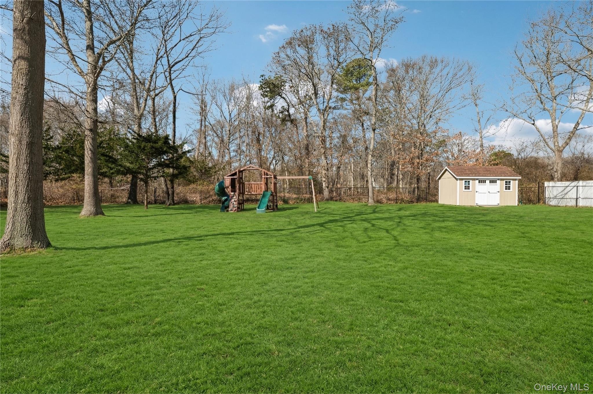 4 Clinton Avenue Bellport, NY 11713 - Photo 33 of 34 a view of a volley ball court