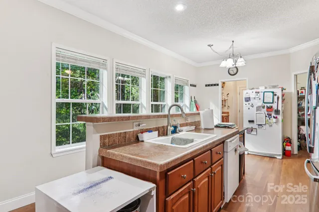 a view of living room with furniture and window