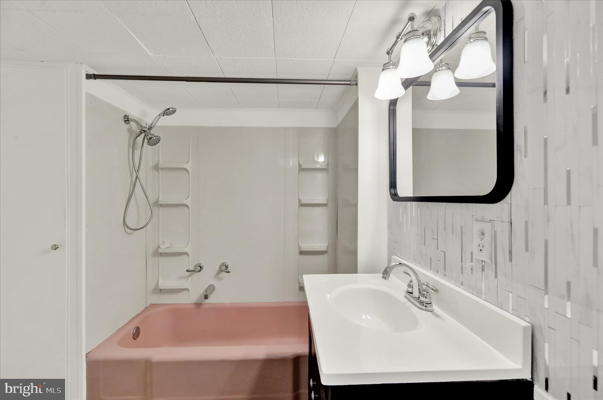 1086 Heffner Lane Reading, PA 19605 - Photo 13 of 44 a bathroom with a sink and a mirror