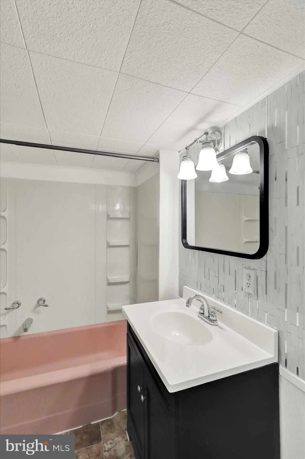 1086 Heffner Lane Reading, PA 19605 - Photo 14 of 44 a bathroom with a sink and a mirror