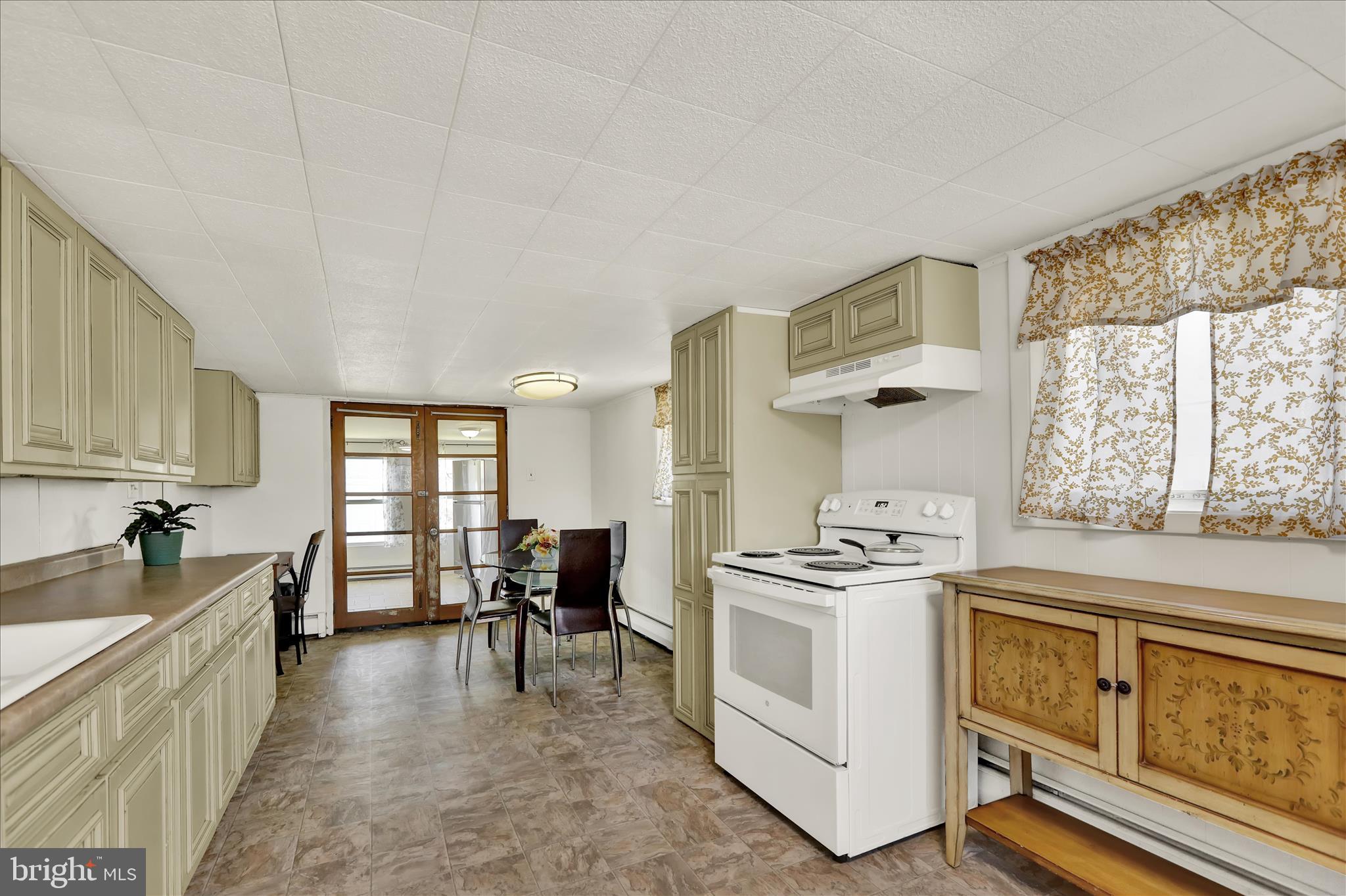 1086 Heffner Lane Reading, PA 19605 - Photo 15 of 44 a kitchen that has a stove and a sink