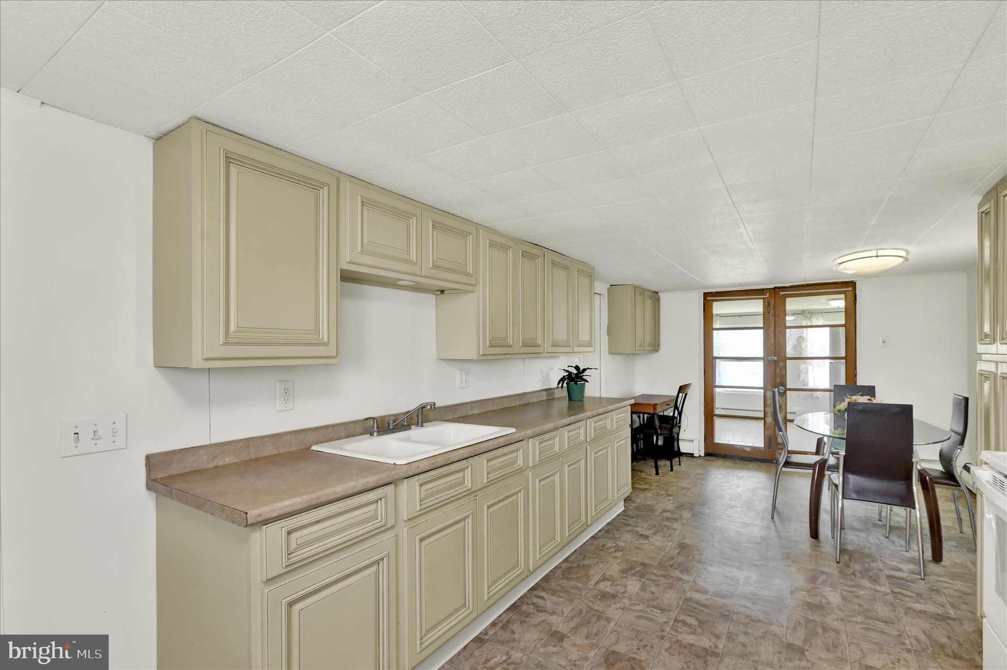 1086 Heffner Lane Reading, PA 19605 - Photo 16 of 44 a kitchen that has a sink and chair