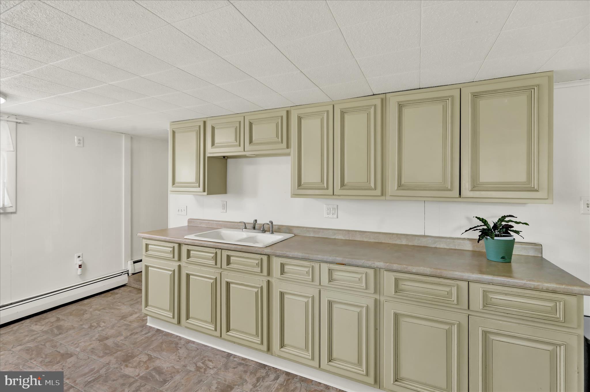 1086 Heffner Lane Reading, PA 19605 - Photo 19 of 44 a kitchen with a sink and cabinets