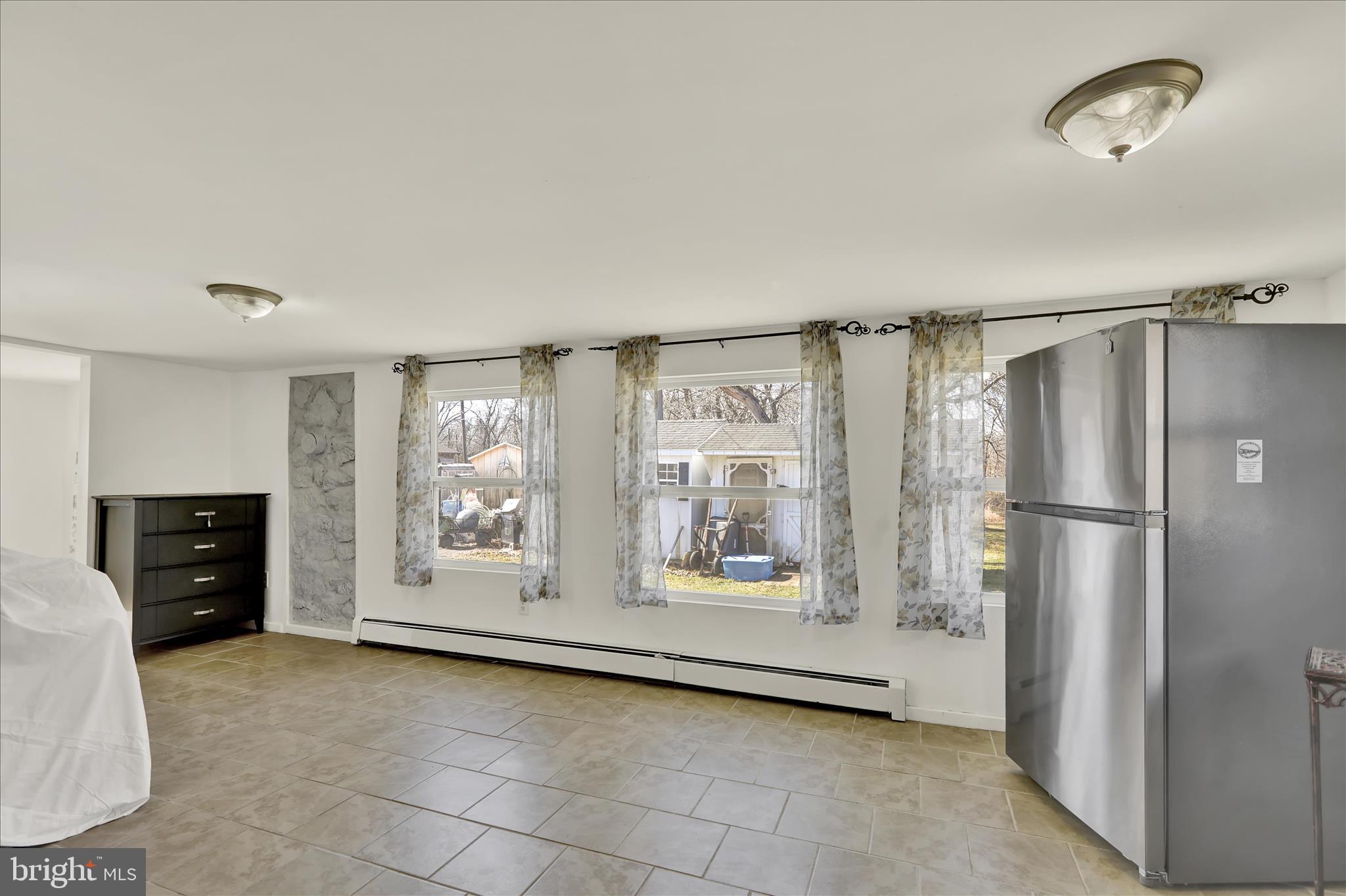 1086 Heffner Lane Reading, PA 19605 - Photo 31 of 44 a kitchen with stainless steel appliances a refrigerator and cabinets