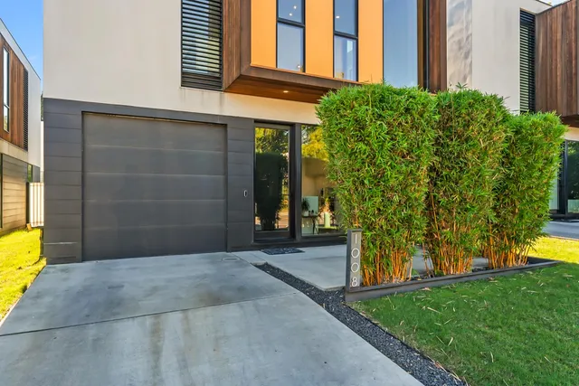 a kitchen with a sink and stove top oven