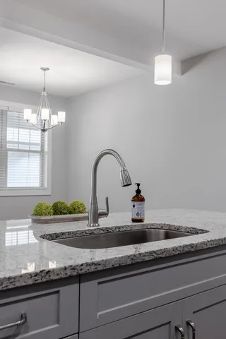 a kitchen with sink and window