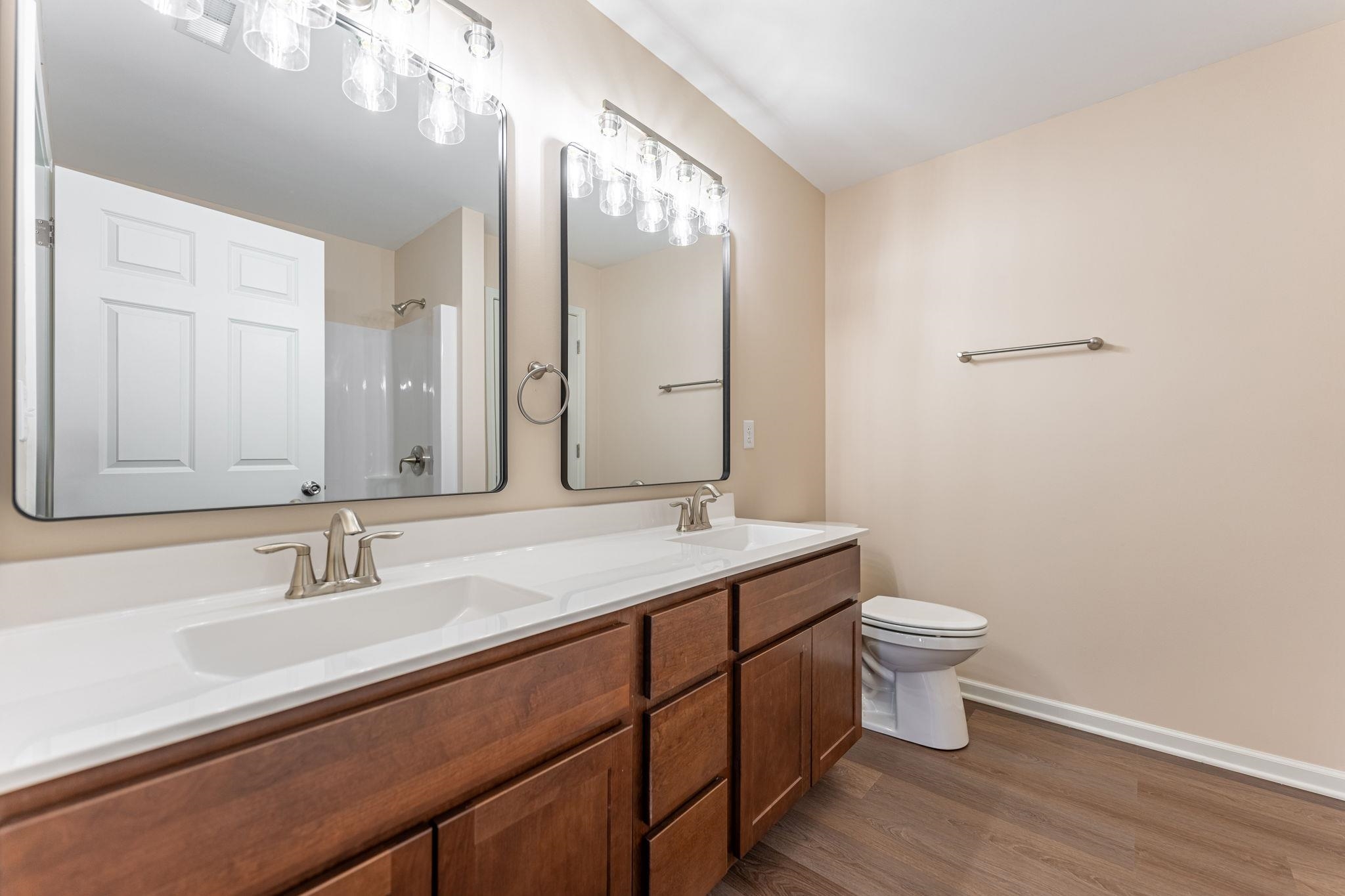 882 Fuller Lane Belvidere, IL 61008 - Photo 27 of 29 a bathroom with a sink and a mirror