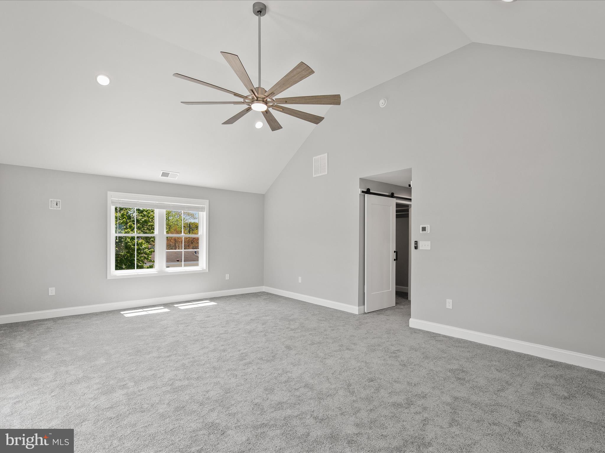 36986 Blue Teal Road Selbyville, DE 19975 - Photo 33 of 54 a view of an empty room with a window