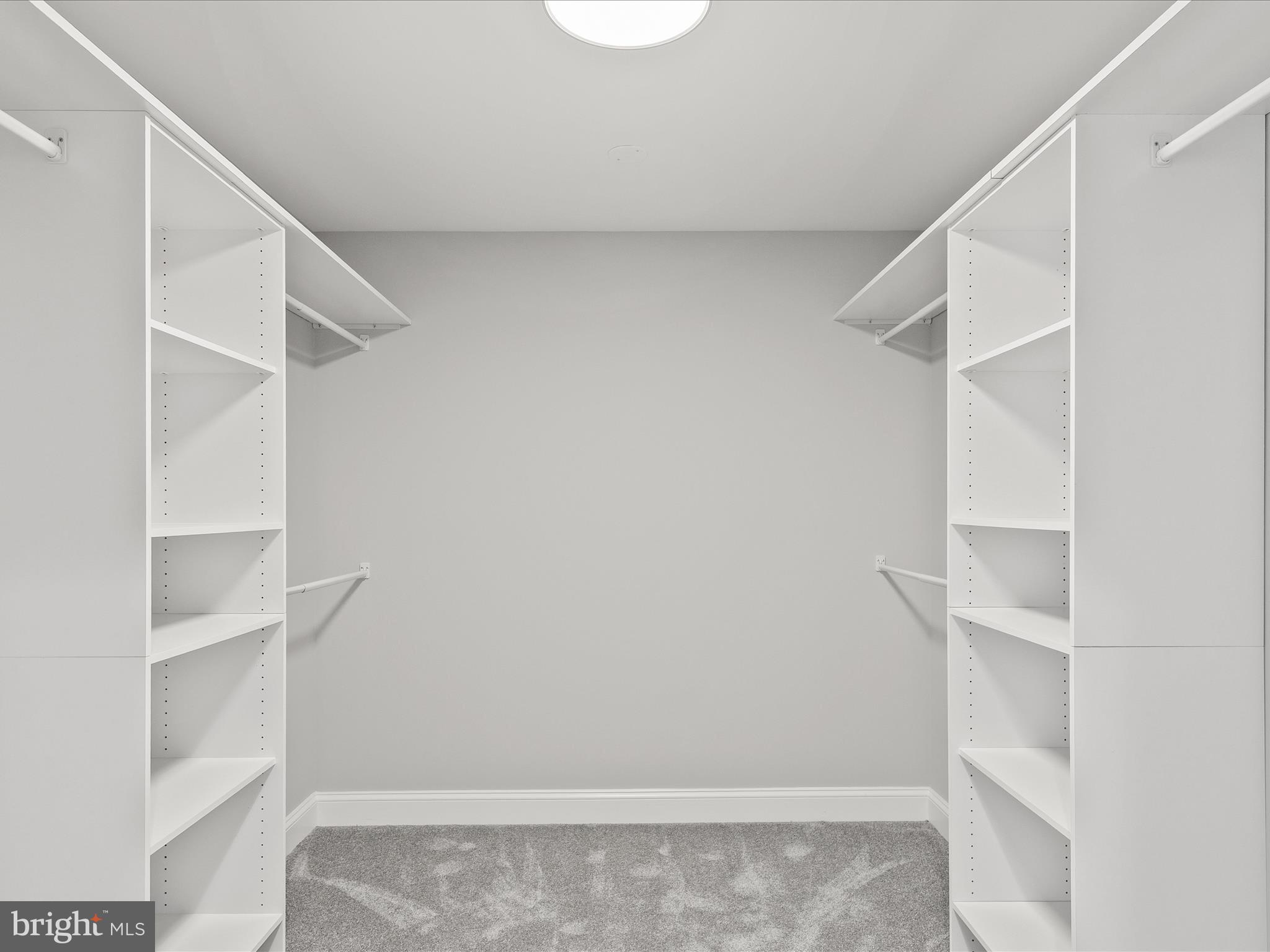 36986 Blue Teal Road Selbyville, DE 19975 - Photo 37 of 54 a view of an empty walk in closet