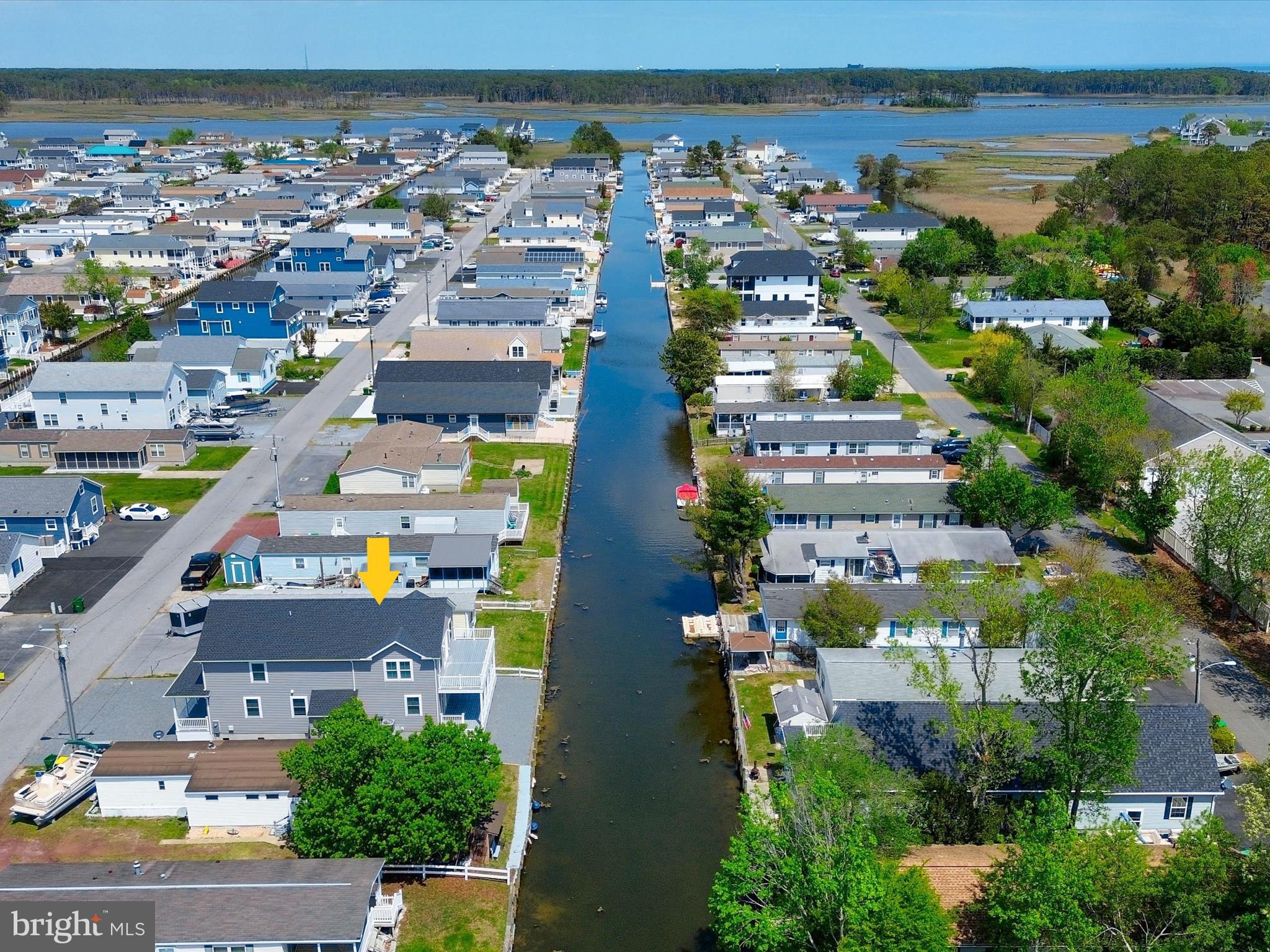 36986 Blue Teal Road Selbyville, DE 19975 - Photo 4 of 54 an aerial view of a city