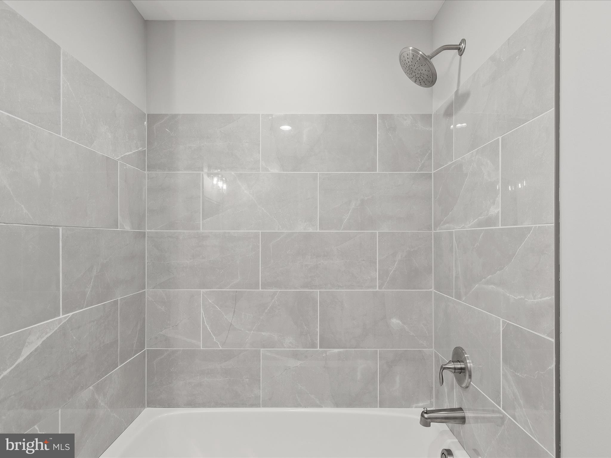 36986 Blue Teal Road Selbyville, DE 19975 - Photo 43 of 54 a close up of a bathtub in a bathroom