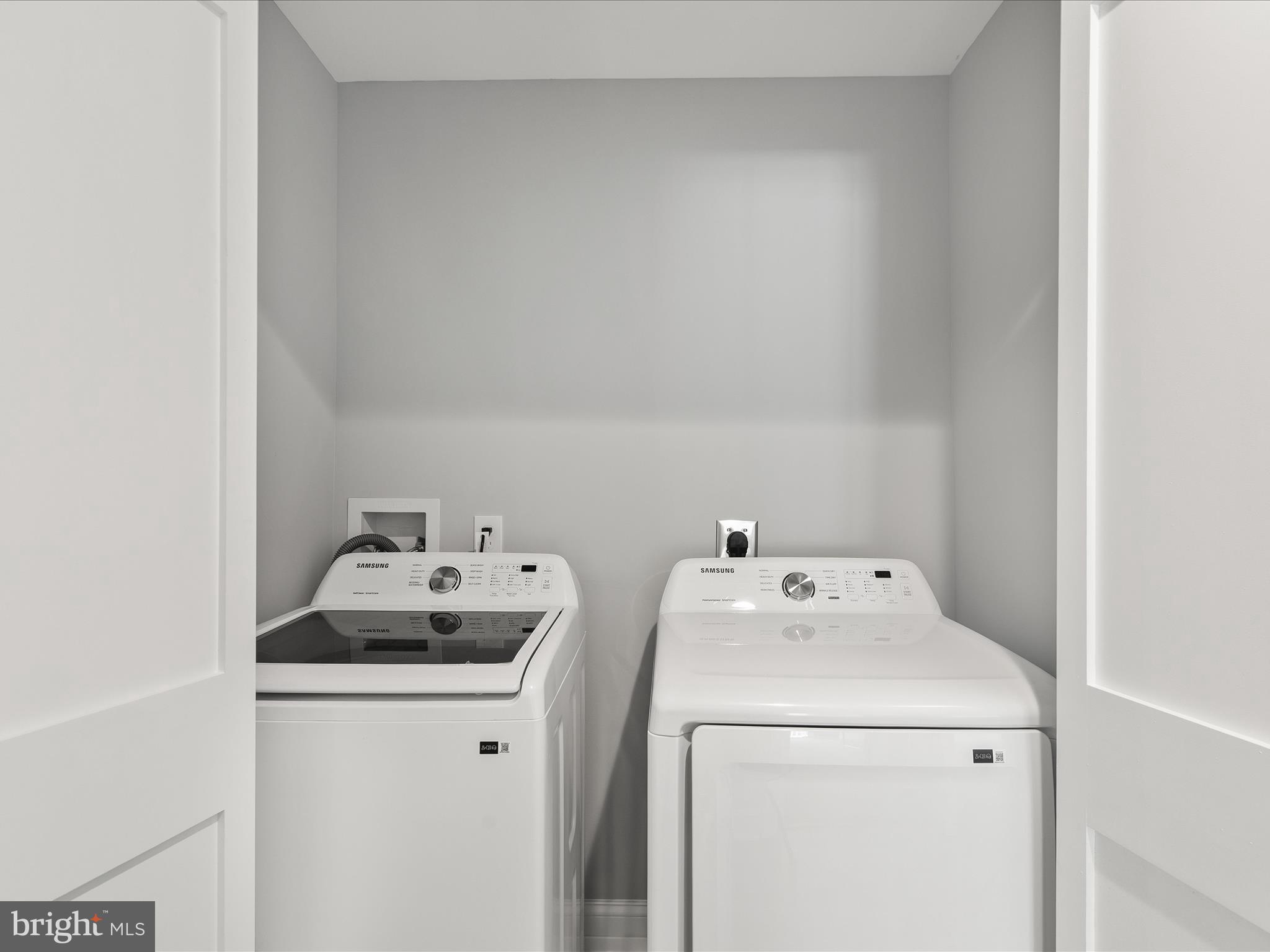 36986 Blue Teal Road Selbyville, DE 19975 - Photo 44 of 54 a utility room with dryer and washer