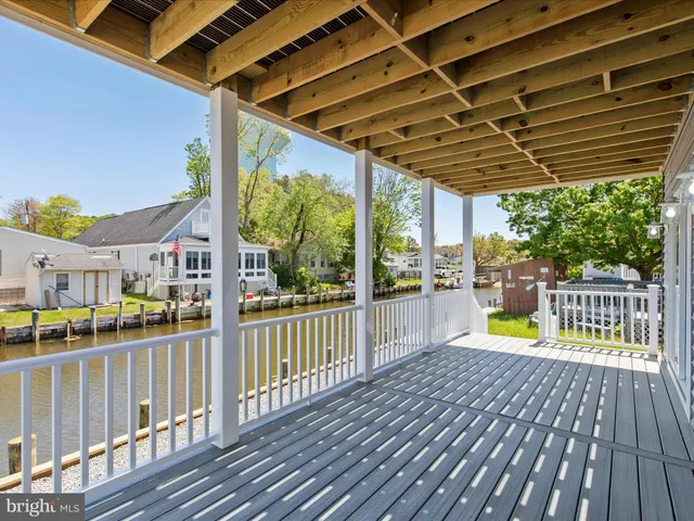 a house with river in front of it
