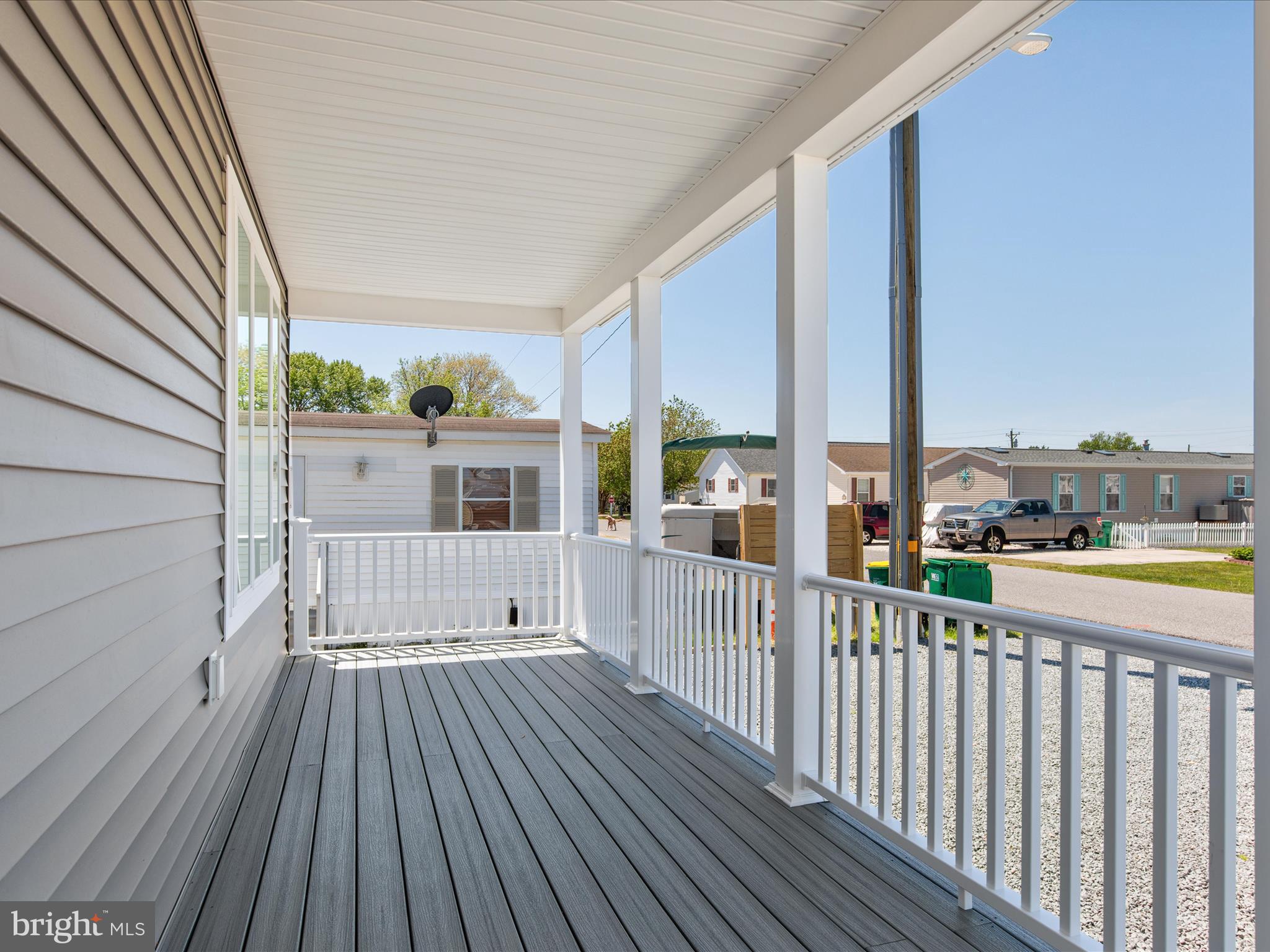 36986 Blue Teal Road Selbyville, DE 19975 - Photo 6 of 54 a view of a balcony with wooden floor