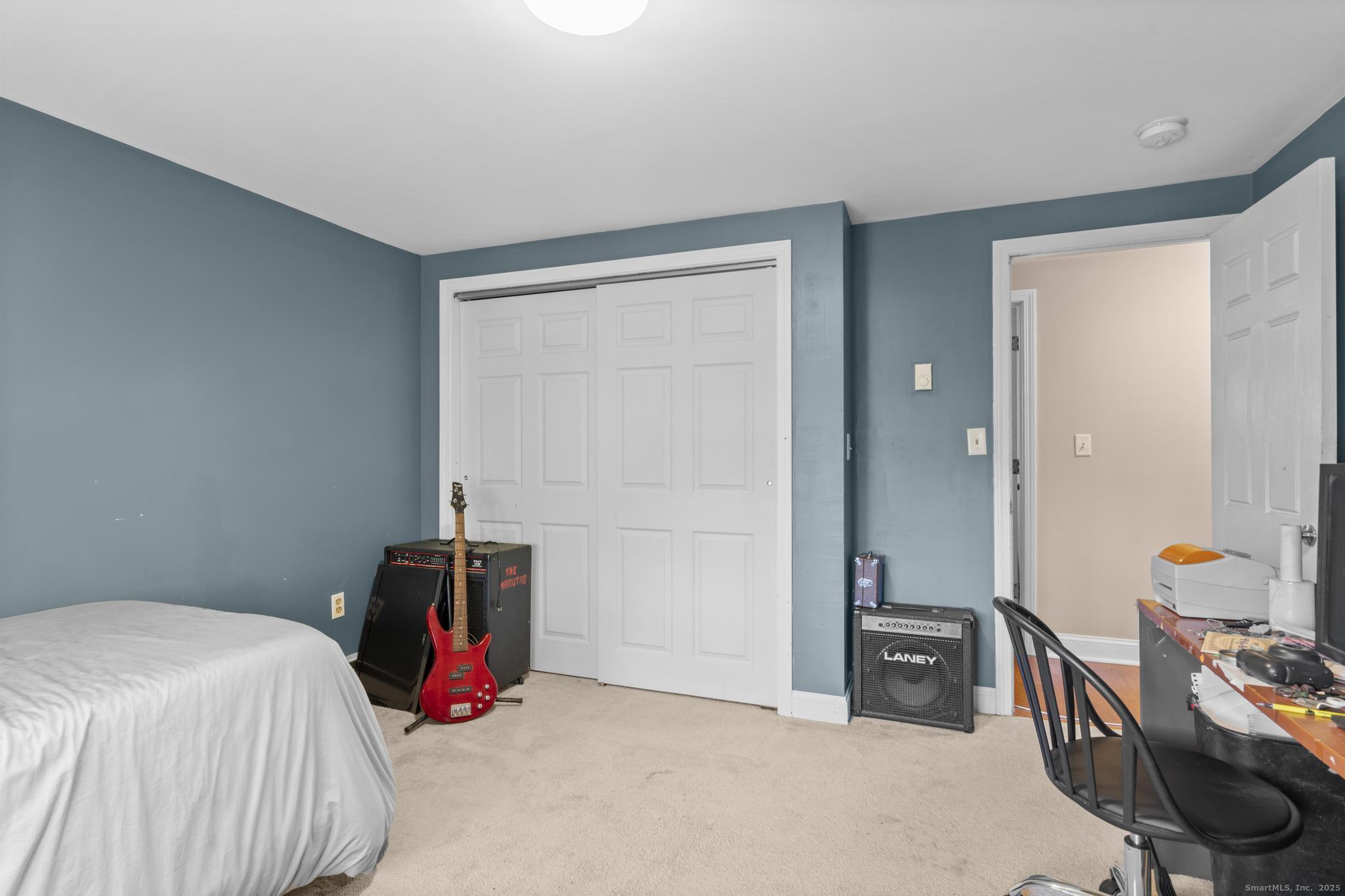 115 Old Wolcott Road Bristol, CT 06010 - Photo 16 of 23 a bedroom with bed and a closet