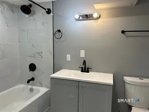 a bathroom with a sink and a tub