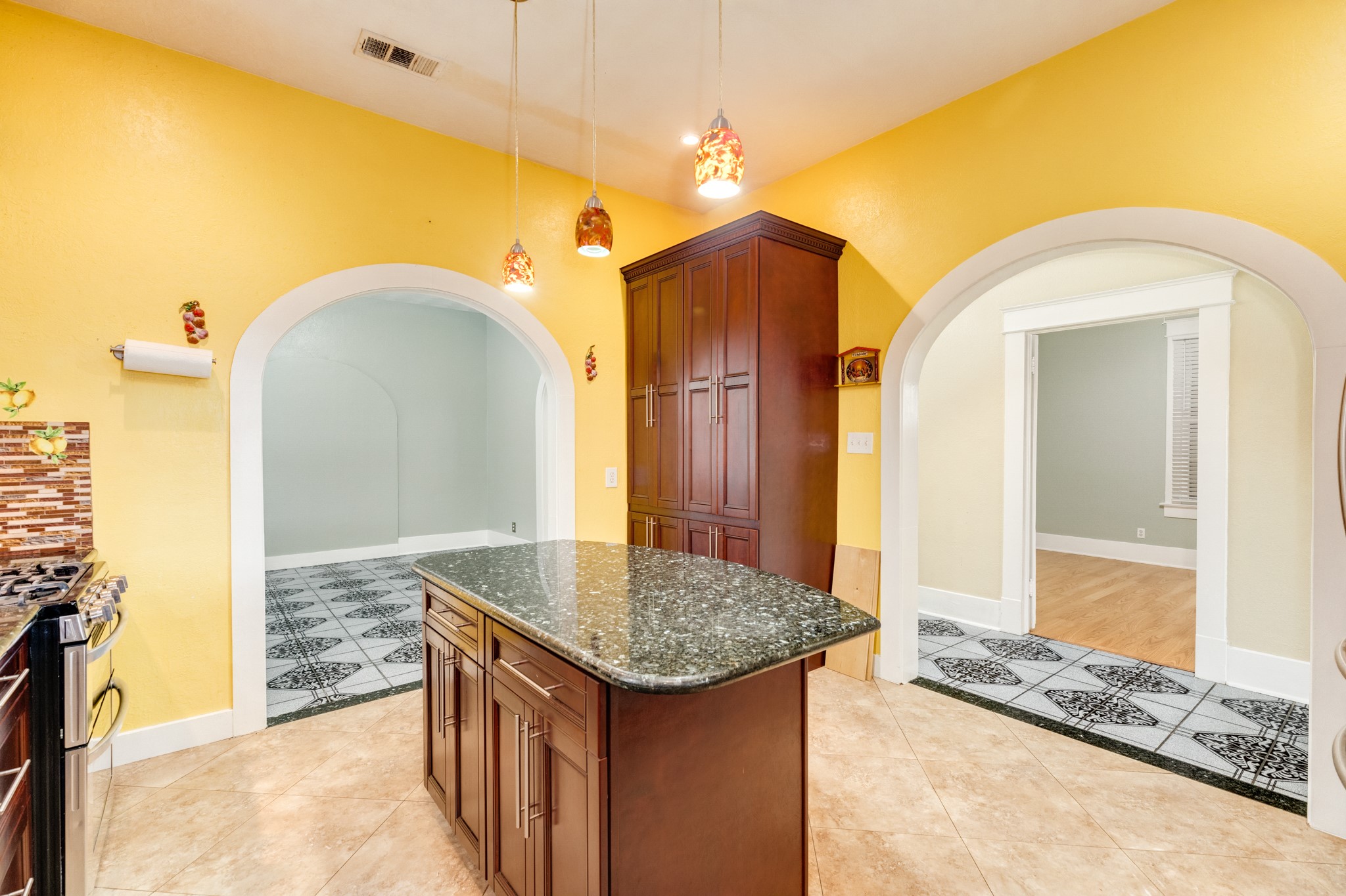 1625 Ave M 1/2 Galveston, TX 77550 - Photo 13 of 24 a bathroom with a granite countertop sink and a mirror