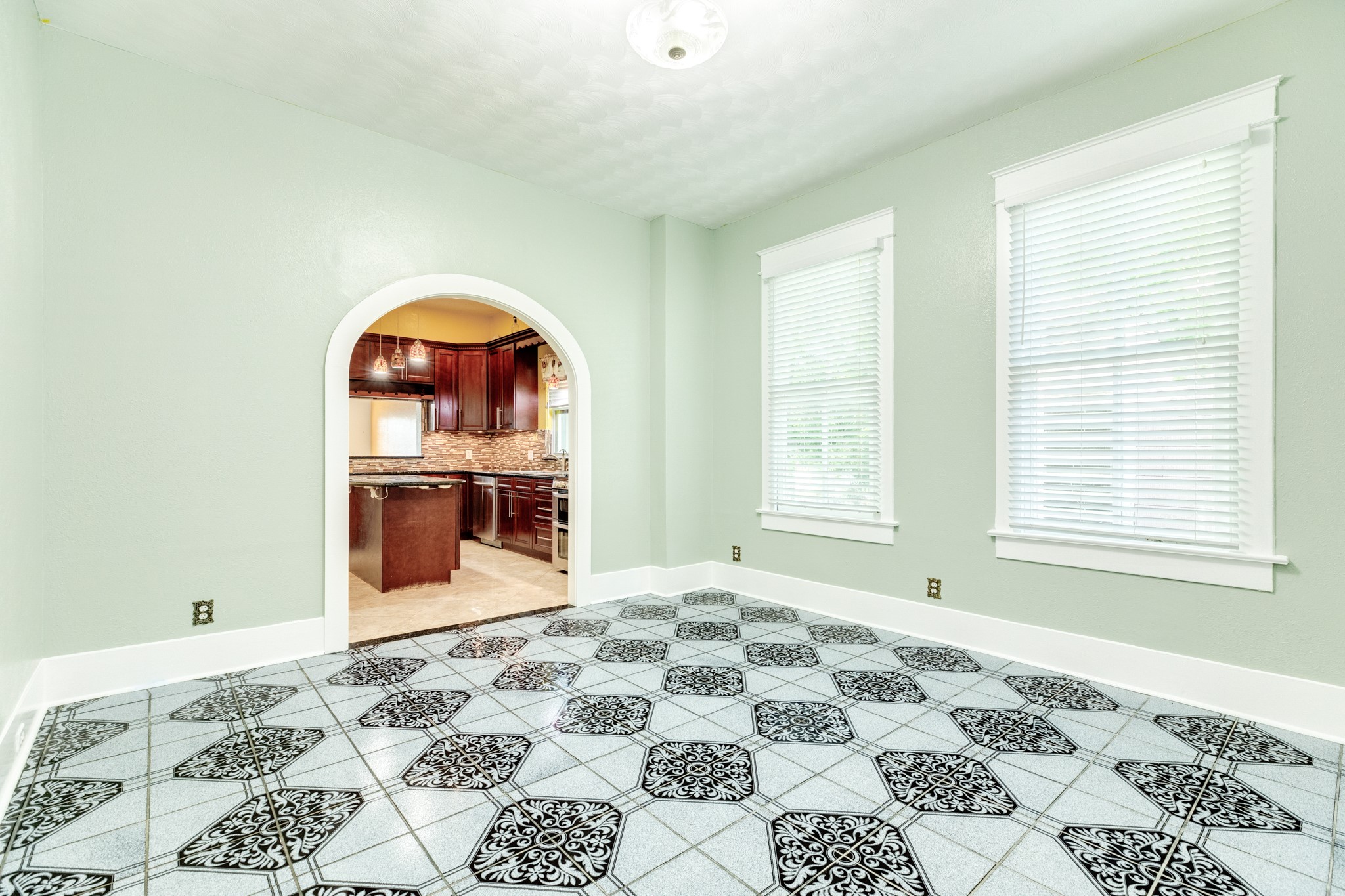 1625 Ave M 1/2 Galveston, TX 77550 - Photo 15 of 24 a bedroom with a bed and a window