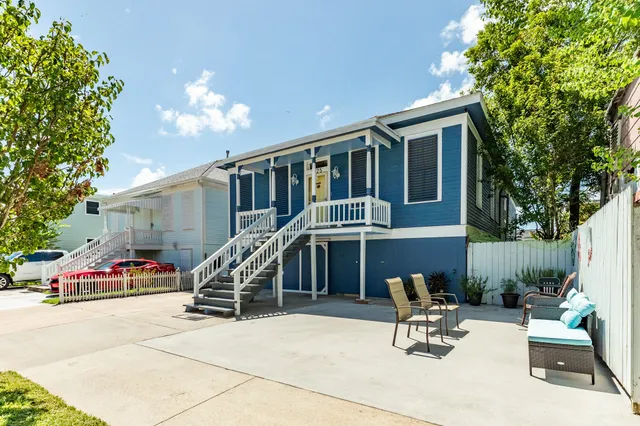 a view of a house with sitting area and furniture