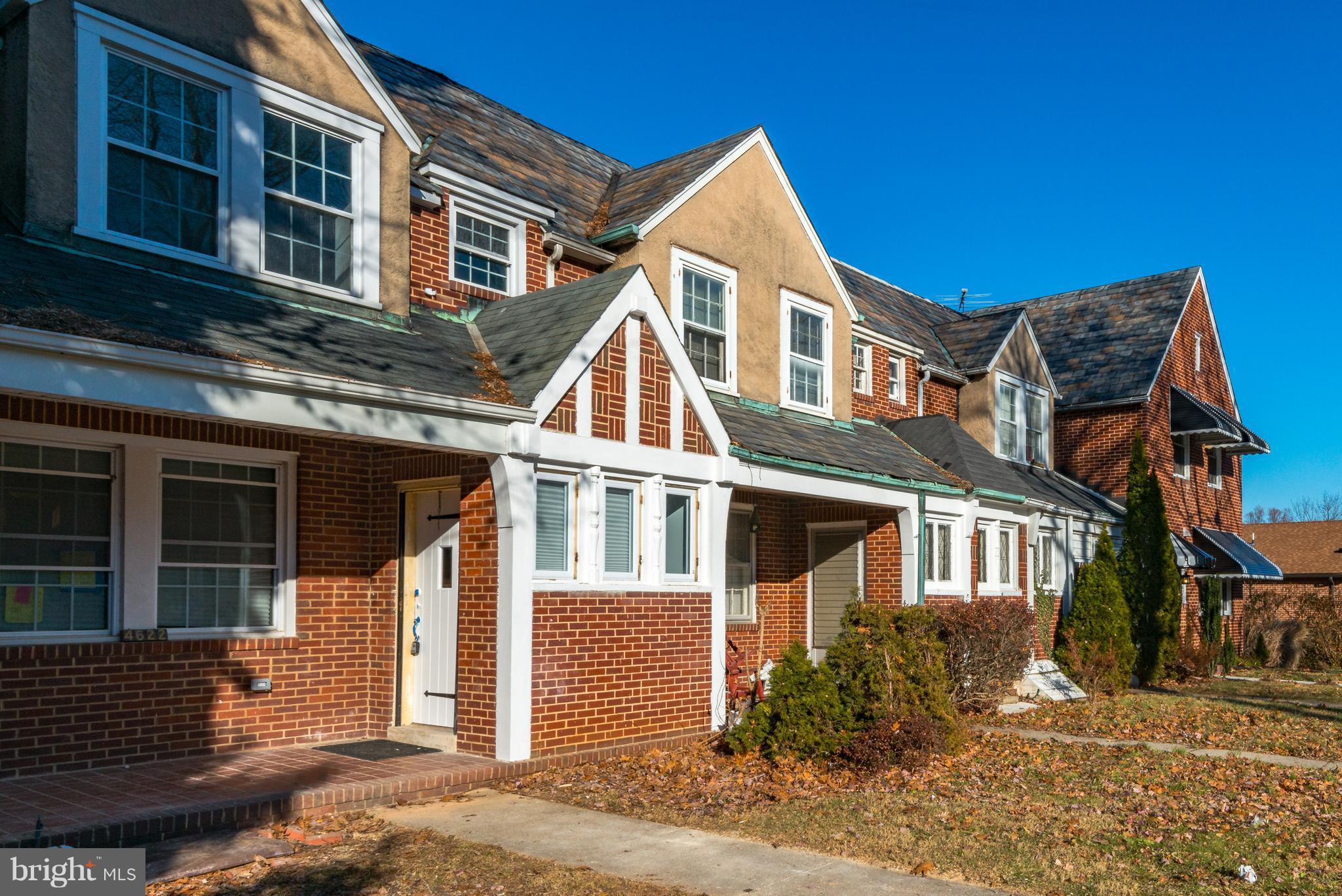 4622 Rokeby Road Baltimore, MD 21229 - Photo 1 of 27 a front view of a house with a yard