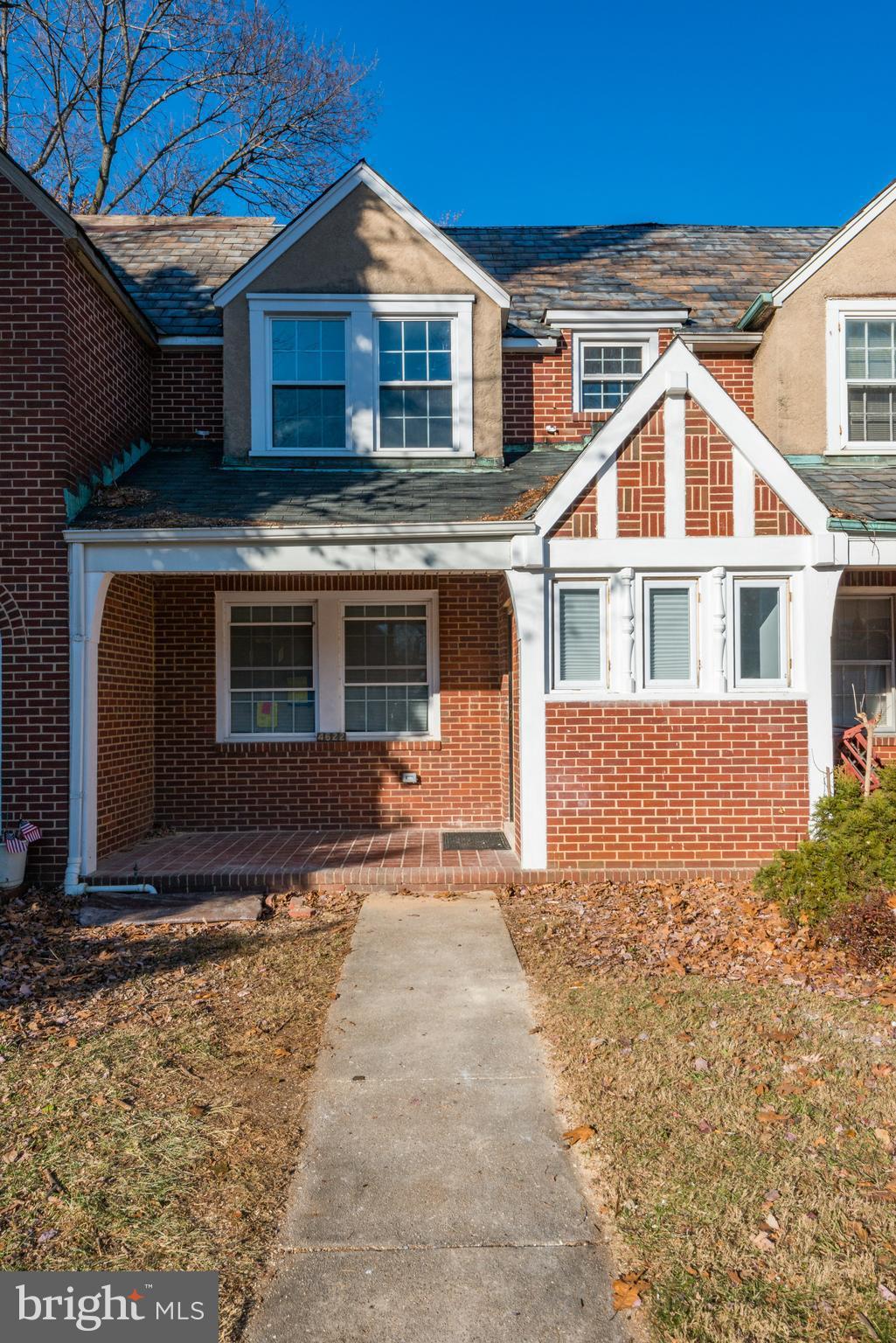 4622 Rokeby Road Baltimore, MD 21229 - Photo 2 of 27 a front view of a house with a yard