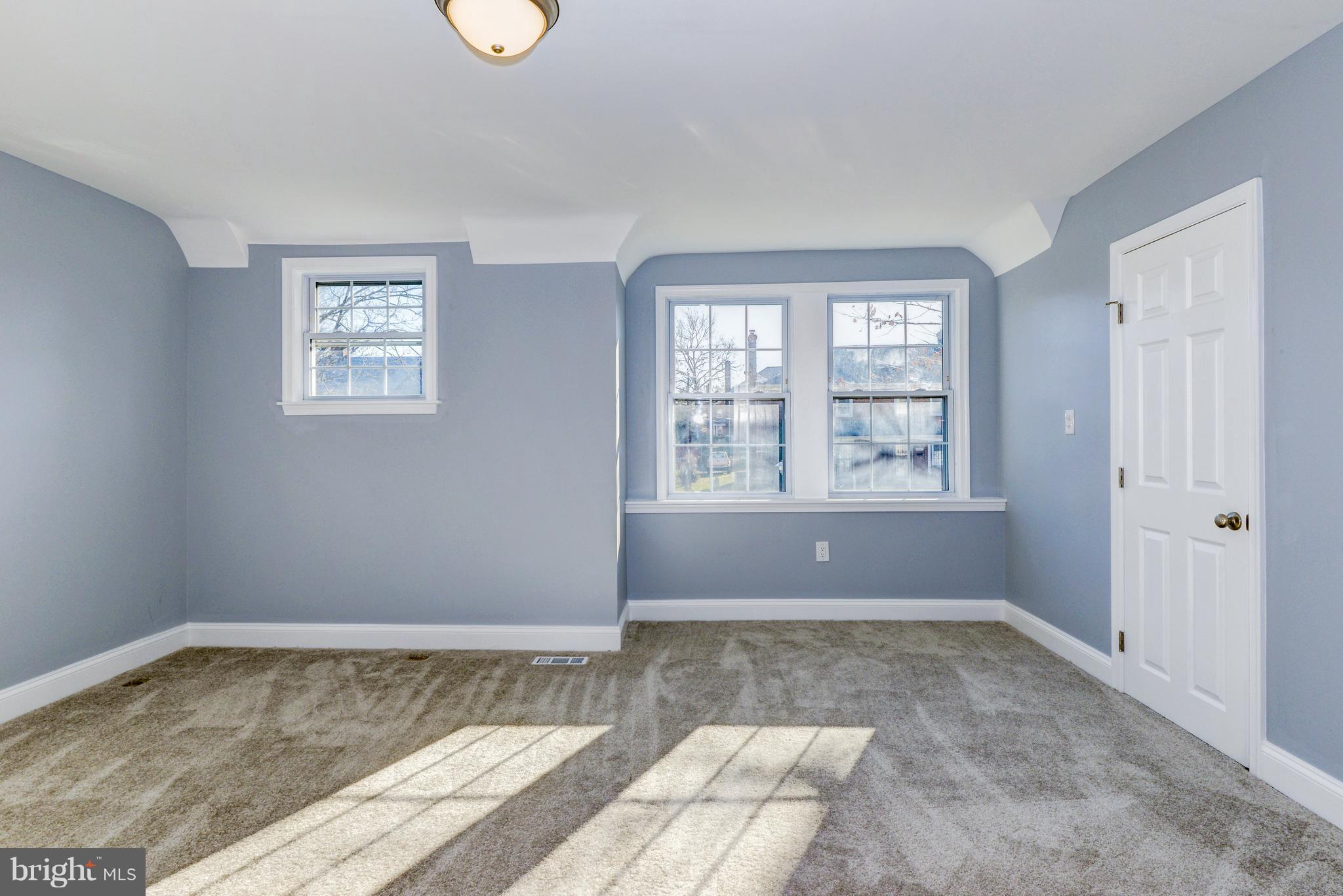4622 Rokeby Road Baltimore, MD 21229 - Photo 14 of 27 a view of an empty room with a window