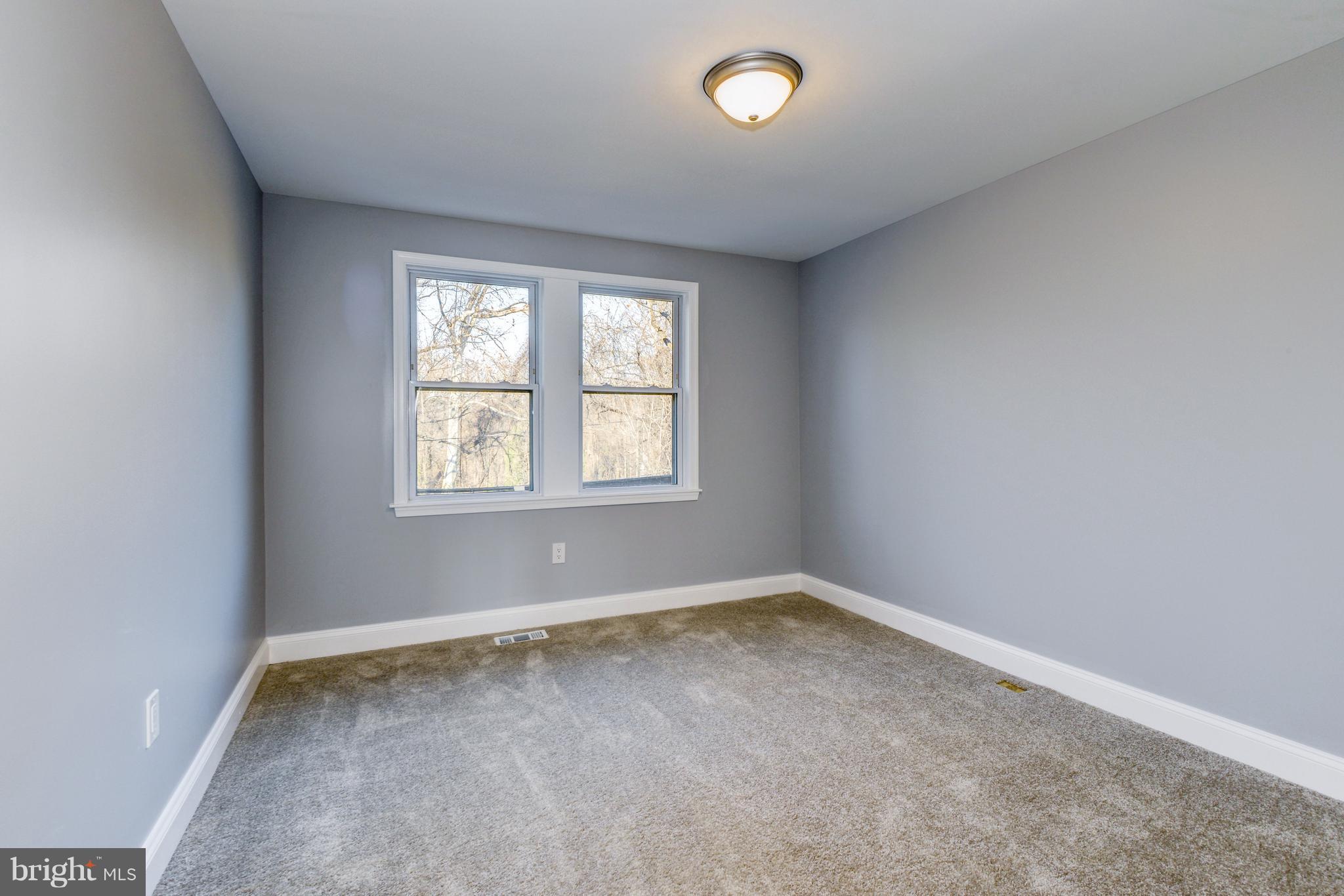 4622 Rokeby Road Baltimore, MD 21229 - Photo 18 of 27 an empty room with a window