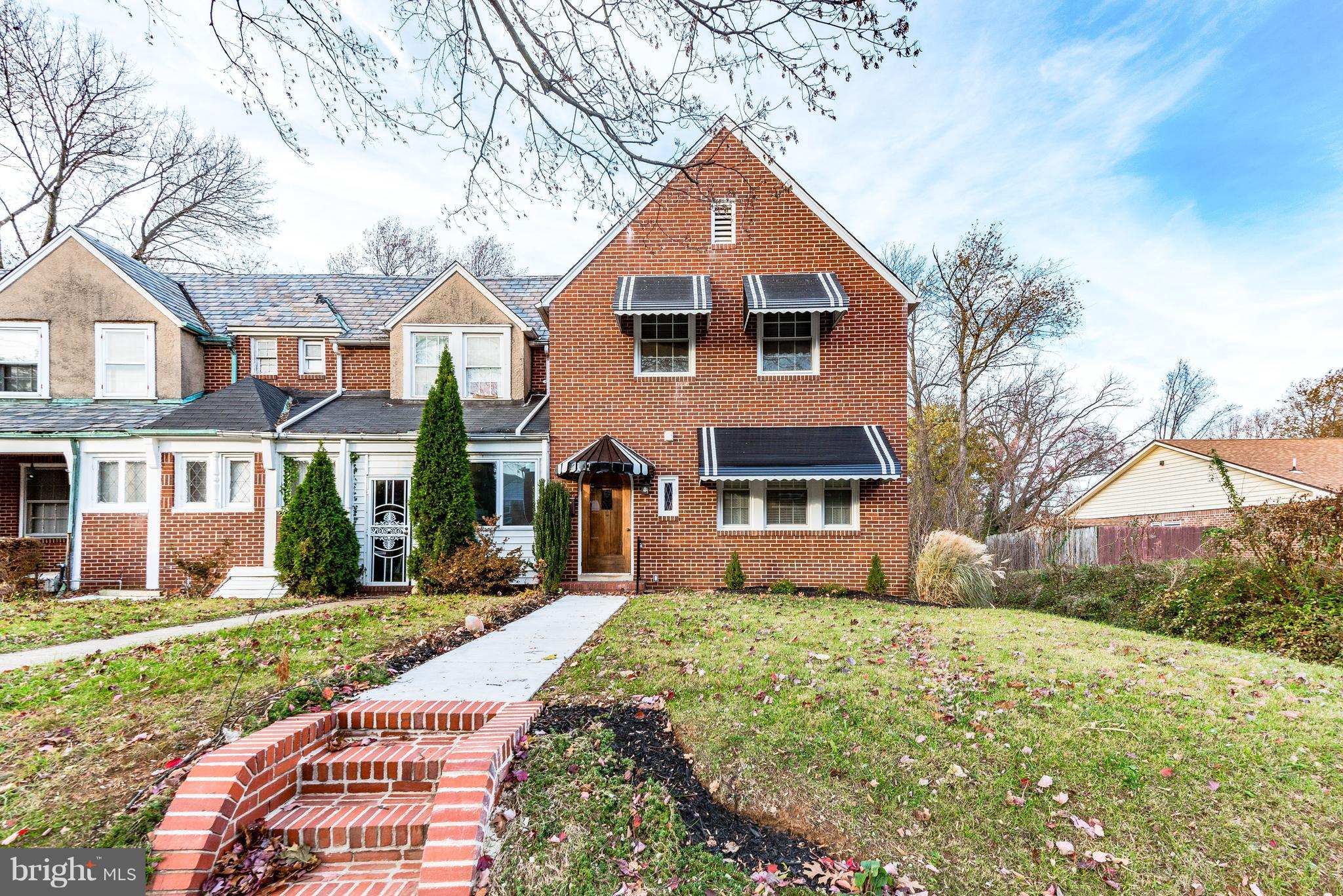 4622 Rokeby Road Baltimore, MD 21229 - Photo 26 of 27 a front view of a house with a yard