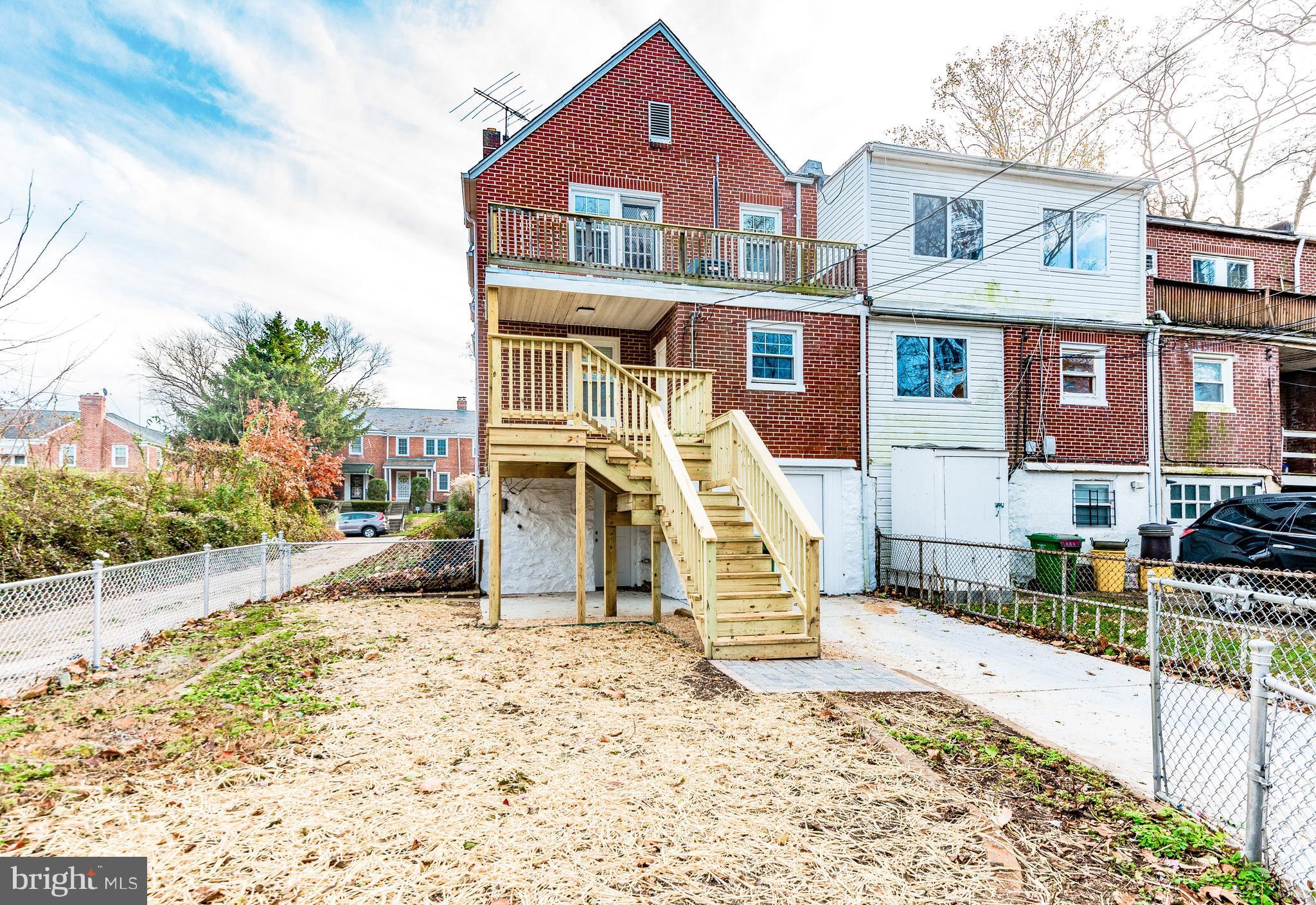 4622 Rokeby Road Baltimore, MD 21229 - Photo 27 of 27 a front view of a house with a porch