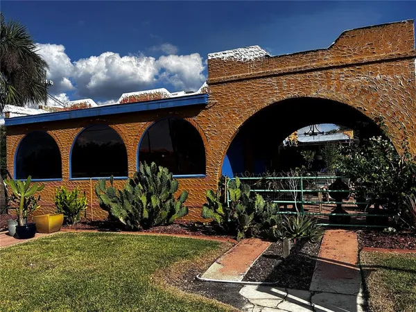 a view of house with outdoor space