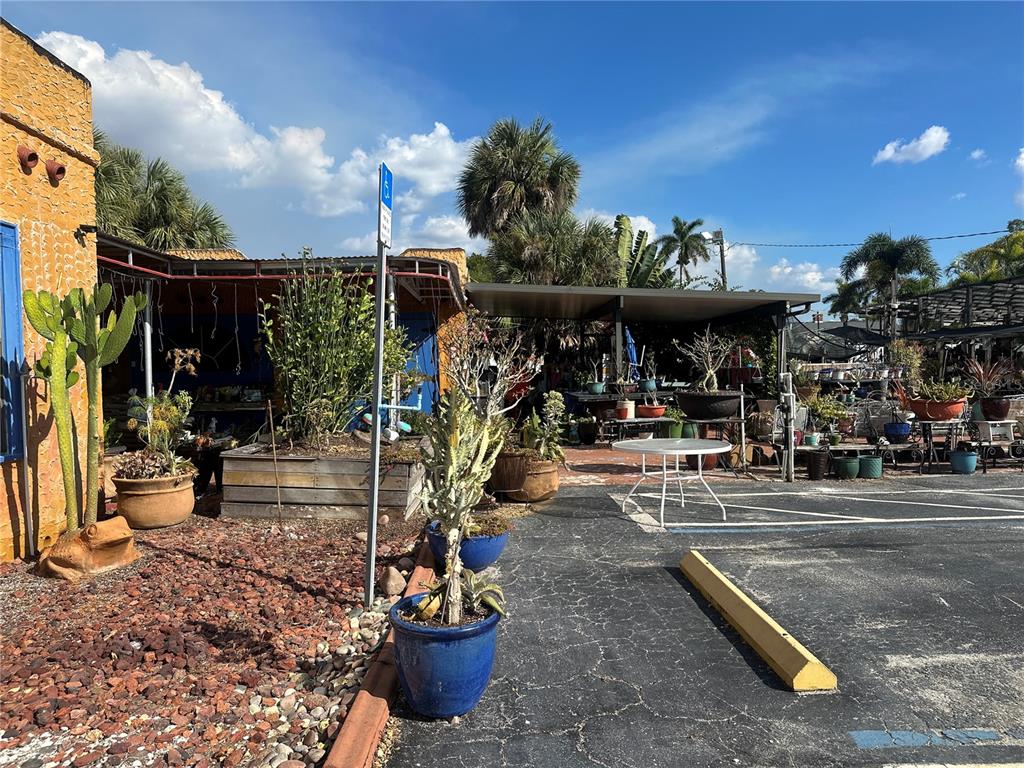 6188 Elliott Street Punta Gorda, FL 33950 - Photo 6 of 19 a view of a chairs and tables in patio