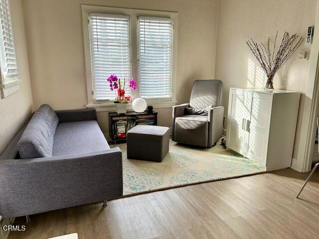 1107 East Howard Street Pasadena, CA 91104 - Photo 3 of 14 a living room with furniture and a window