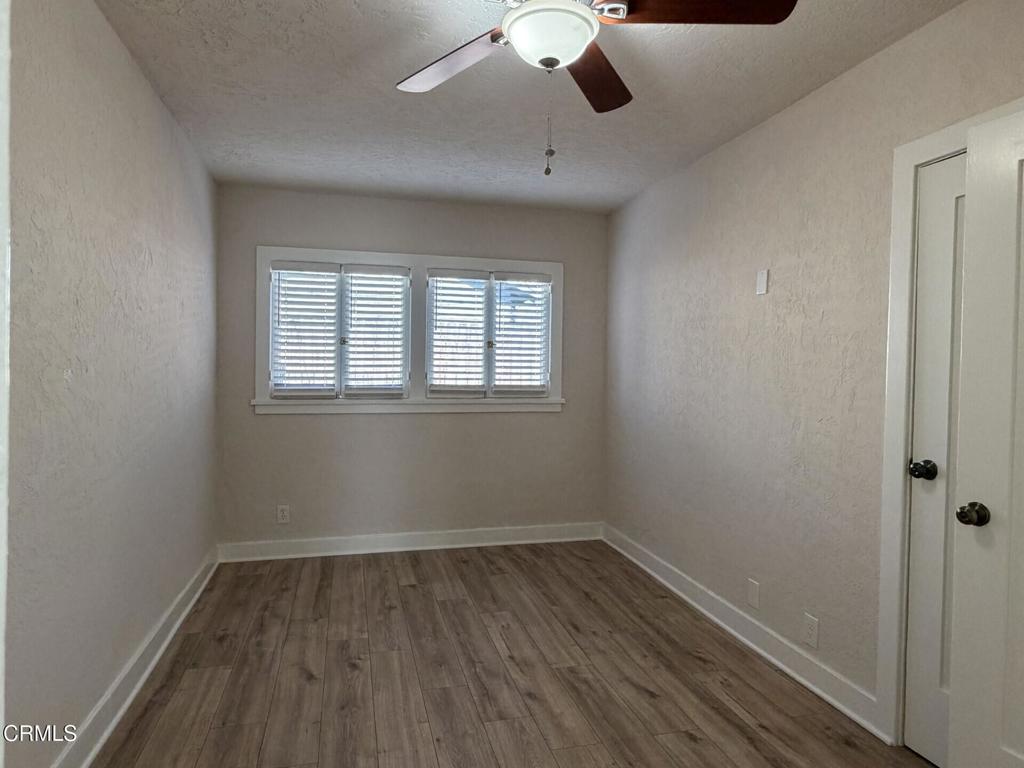 1107 East Howard Street Pasadena, CA 91104 - Photo 10 of 14 an empty room with a window
