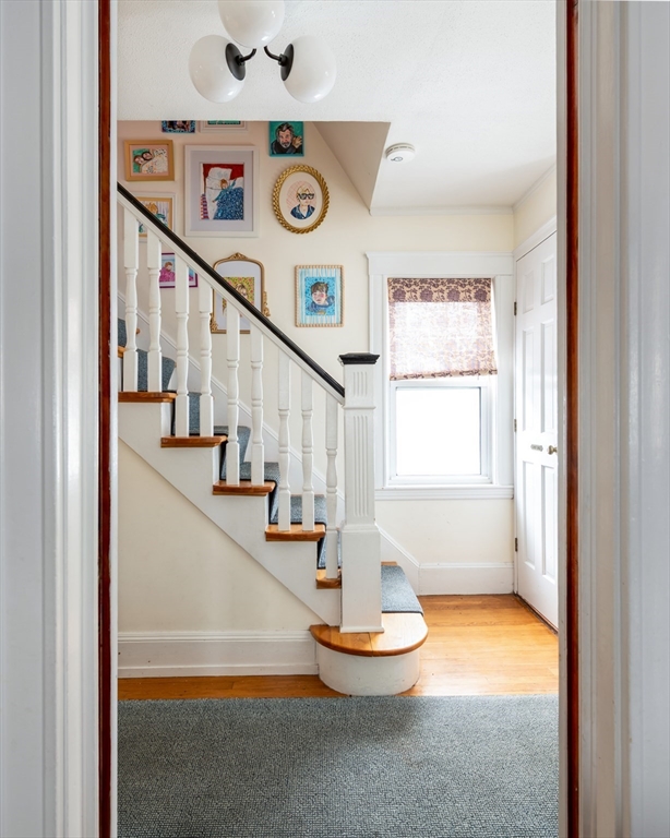 40 Virginia Road Quincy, MA 02169 - Photo 12 of 29 a view of entryway and hall with wooden floor