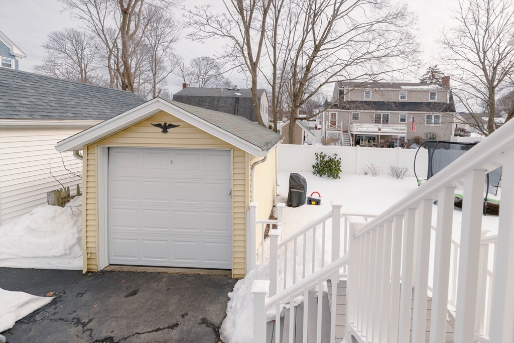 40 Virginia Road Quincy, MA 02169 - Photo 19 of 29 a front view of a house with wooden fence